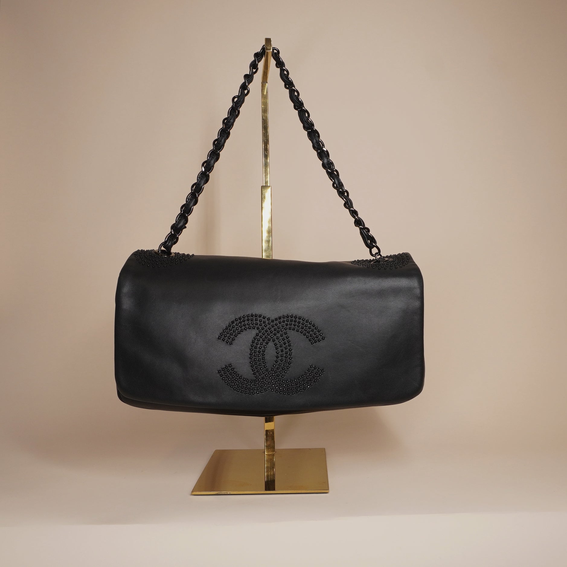 PRE-OWNED Lambskin Studded East West Flap Black