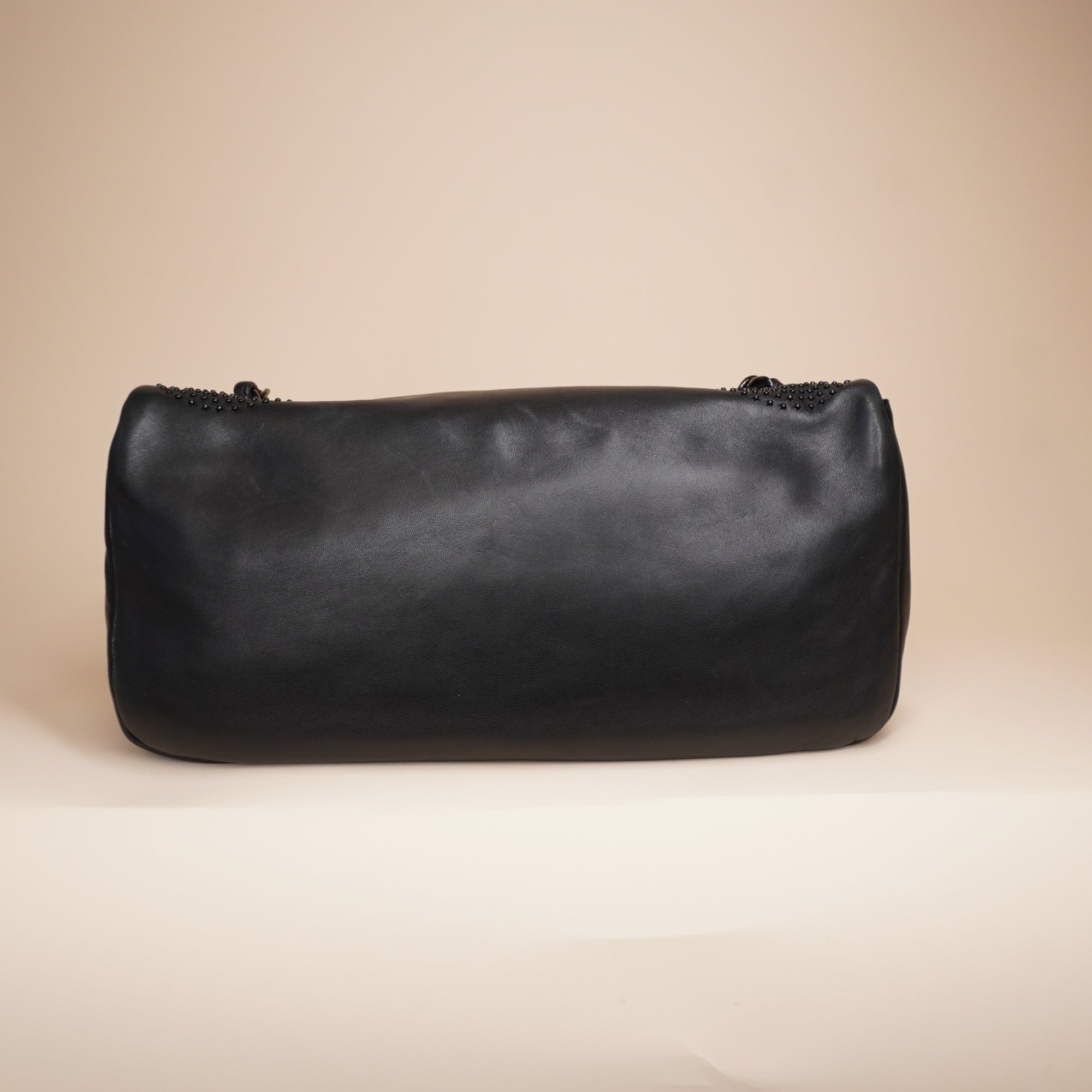 PRE-OWNED Lambskin Studded East West Flap Black