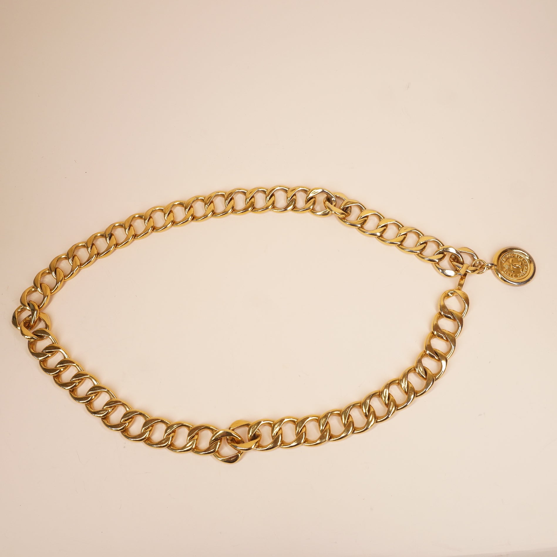 PRE-OWNED CC Gold Chain Belt with Medallion