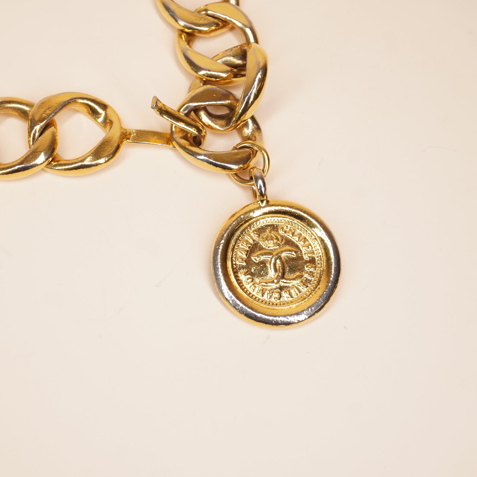 PRE-OWNED CC Gold Chain Belt with Medallion