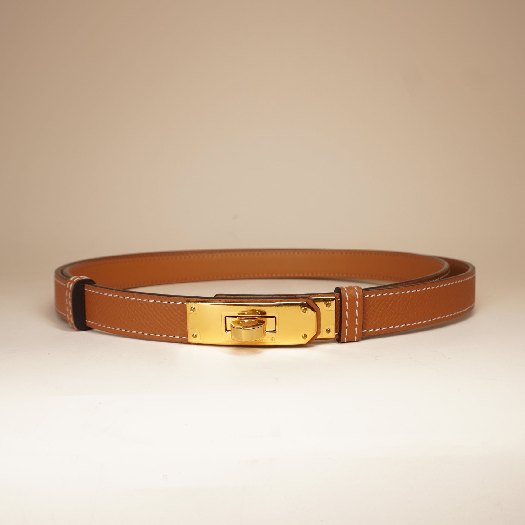 PRE-OWNED Gold Epsom Leather Gold Tone Finish Kelly 18 Adjustable Belt