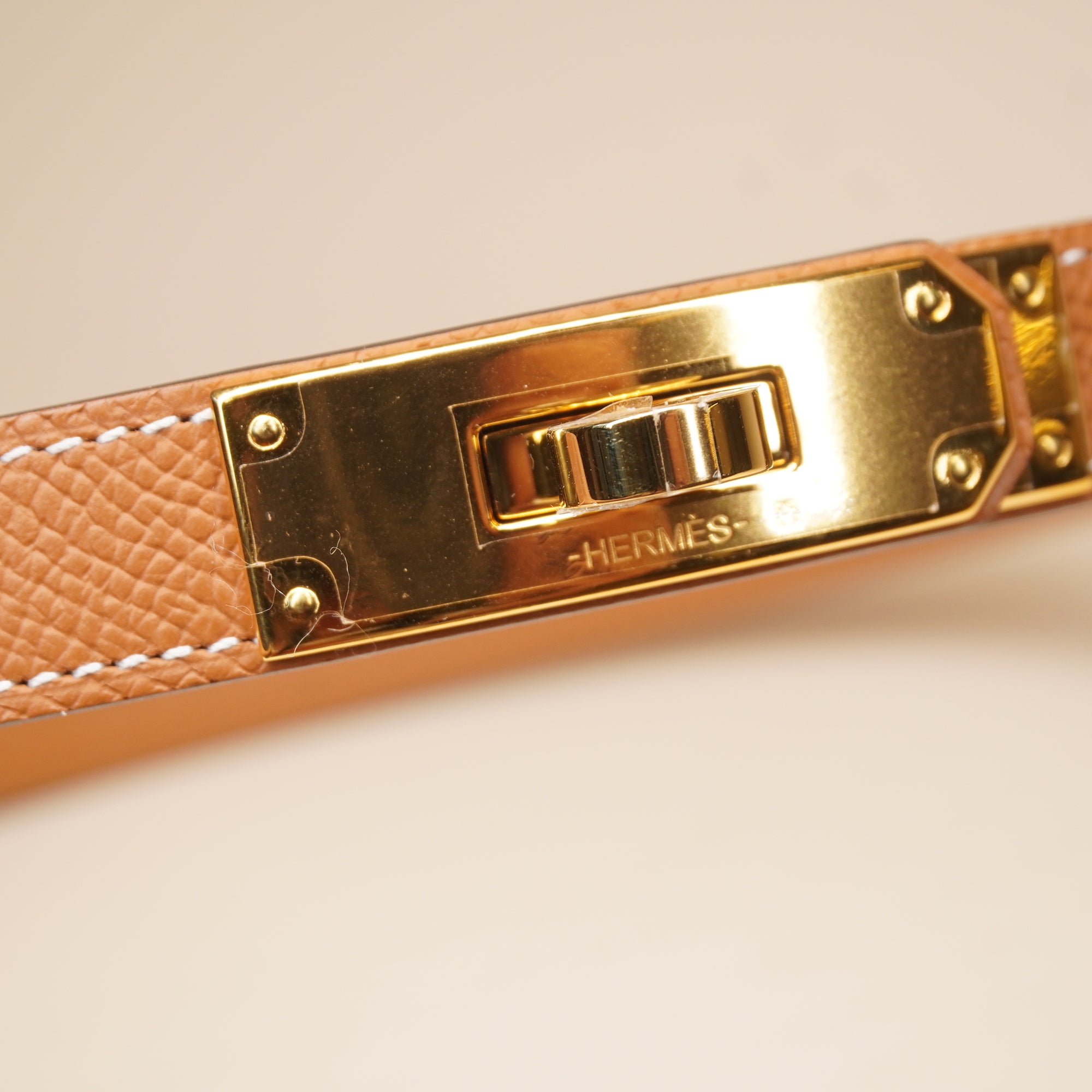 PRE-OWNED Gold Epsom Leather Gold Tone Finish Kelly 18 Adjustable Belt