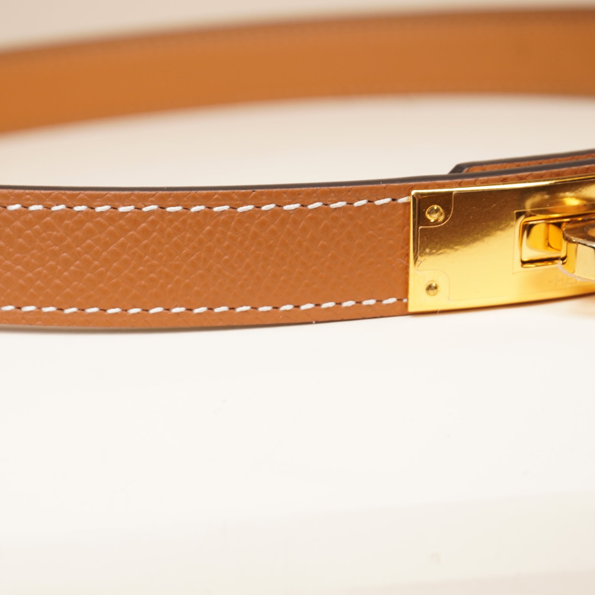 PRE-OWNED Gold Epsom Leather Gold Tone Finish Kelly 18 Adjustable Belt