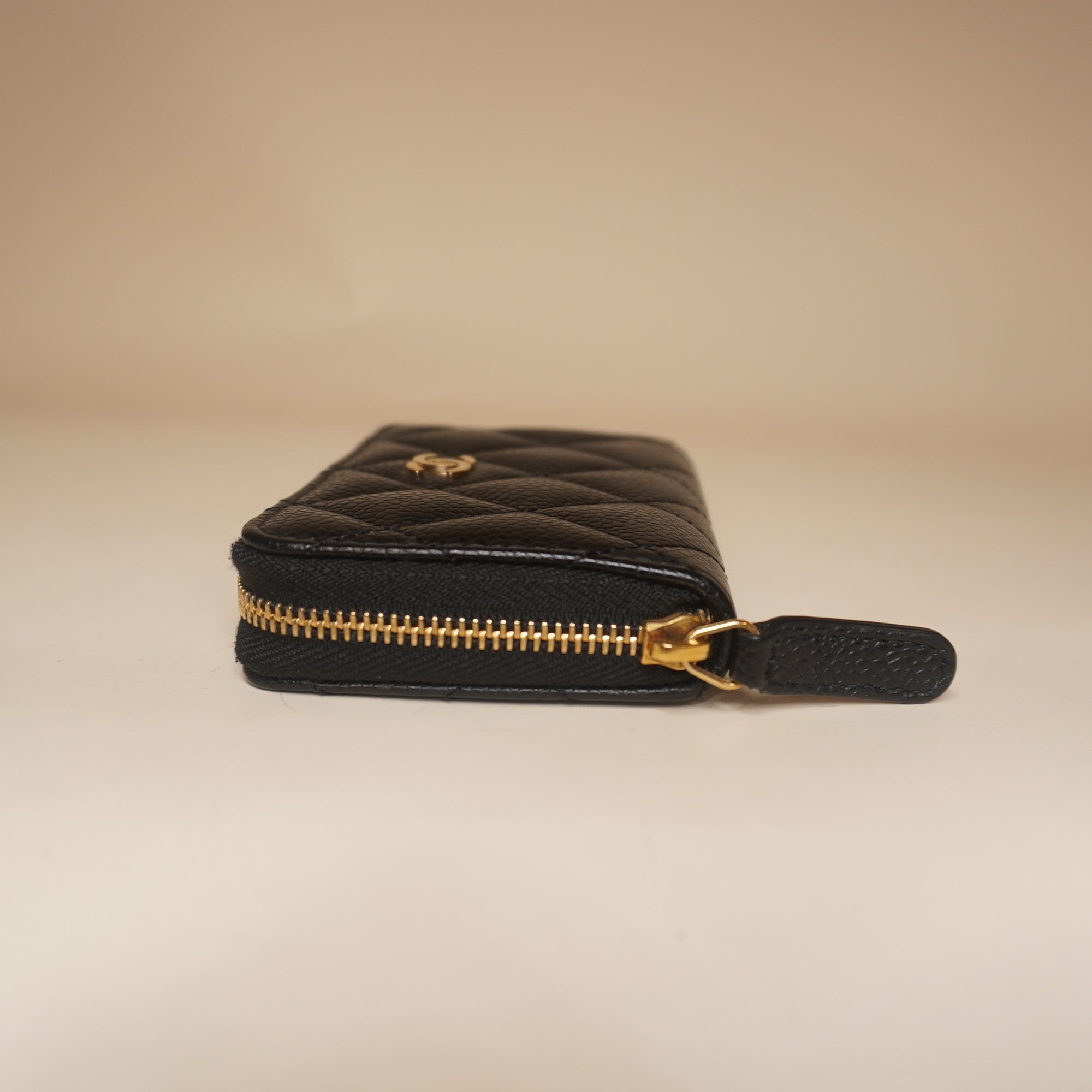 PRE-OWNED Caviar Quilted Zip Coin Purse Black