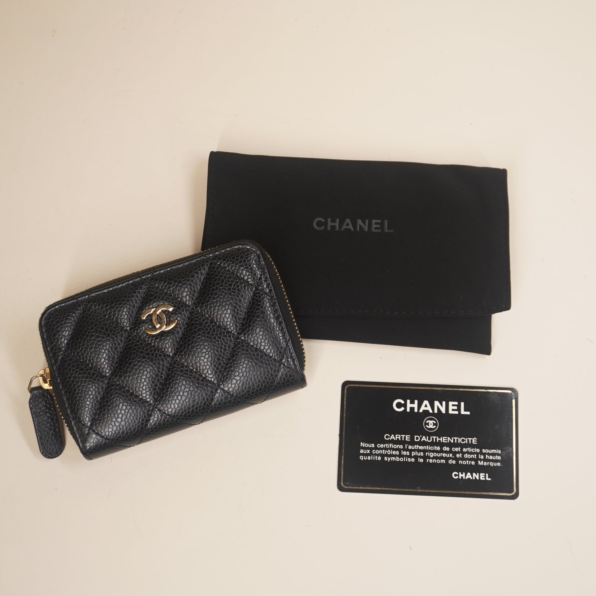 PRE-OWNED Caviar Quilted Zip Coin Purse Black