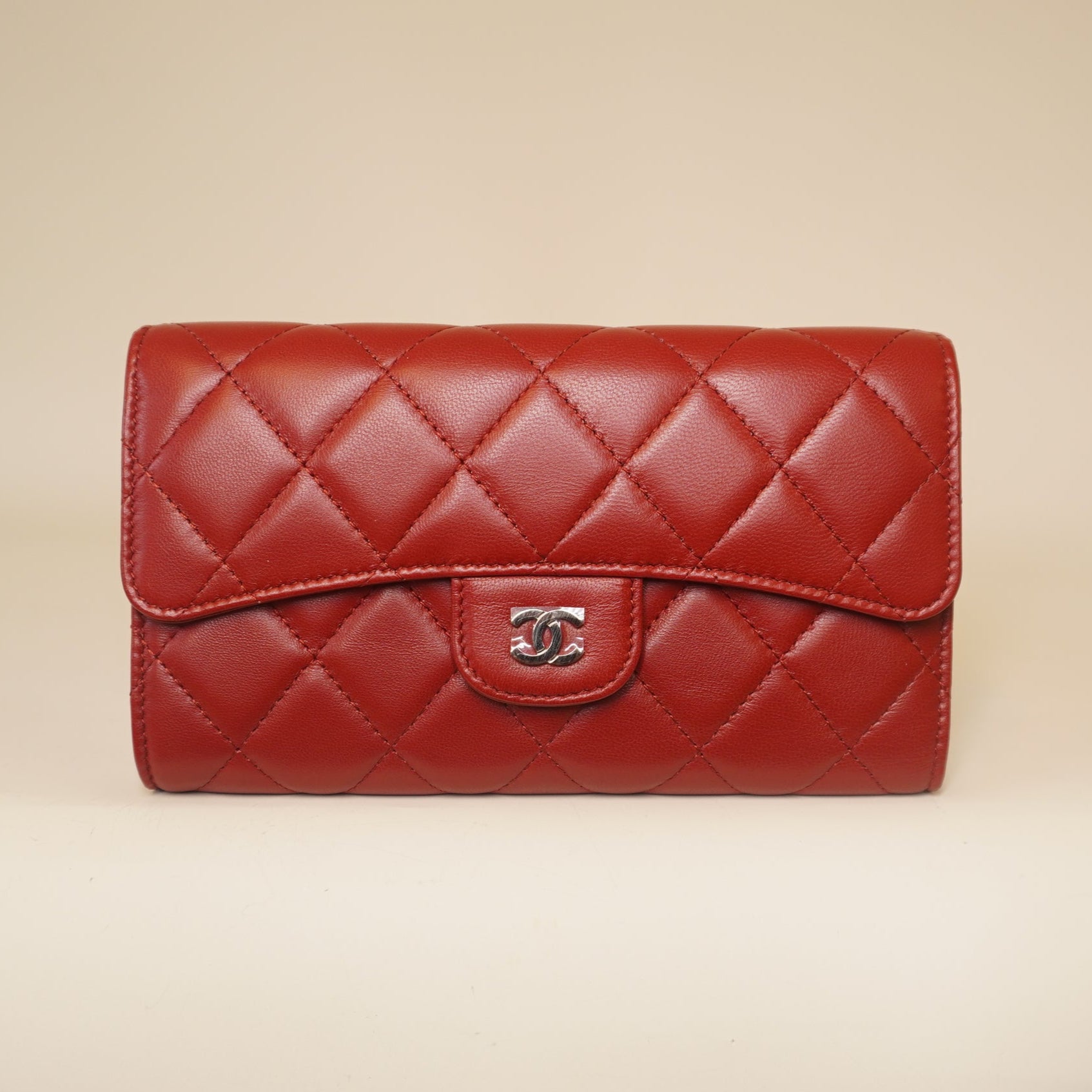 PRE-OWNED CC Red Lambskin Quilted Large Flap Wallet