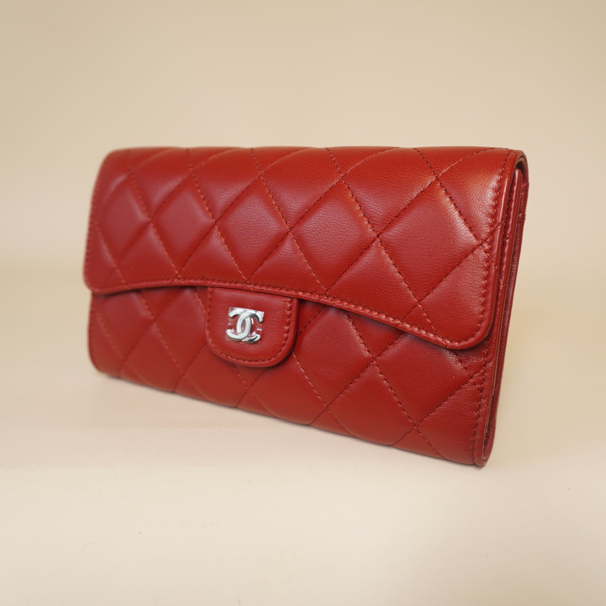 PRE-OWNED CC Red Lambskin Quilted Large Flap Wallet