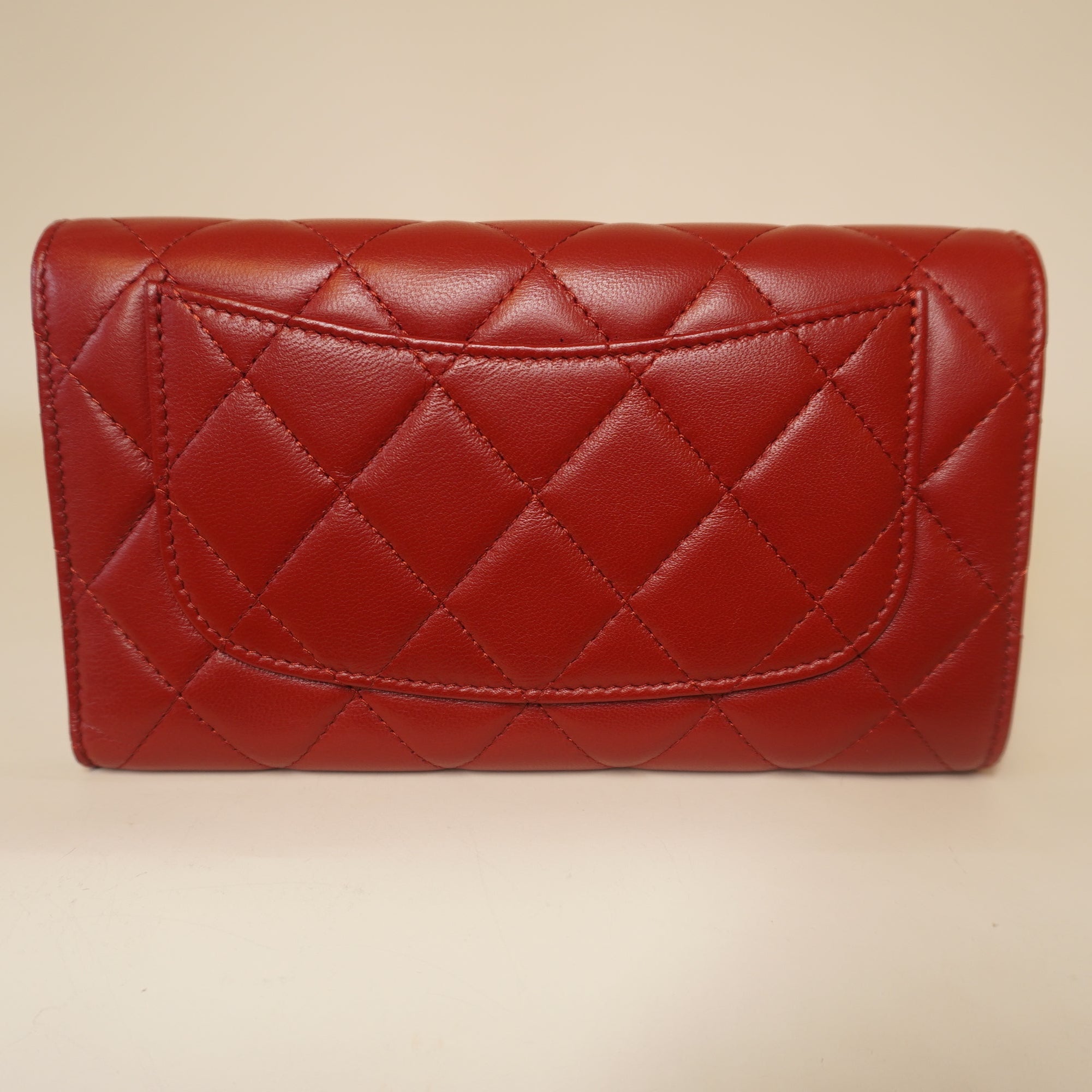 PRE-OWNED CC Red Lambskin Quilted Large Flap Wallet