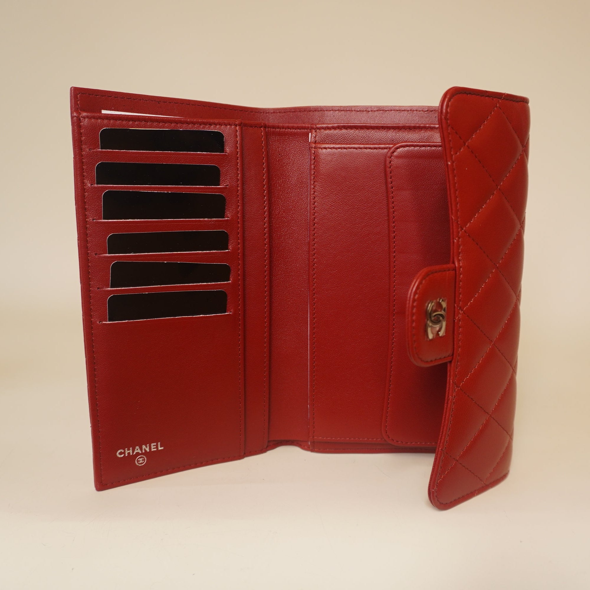 PRE-OWNED CC Red Lambskin Quilted Large Flap Wallet