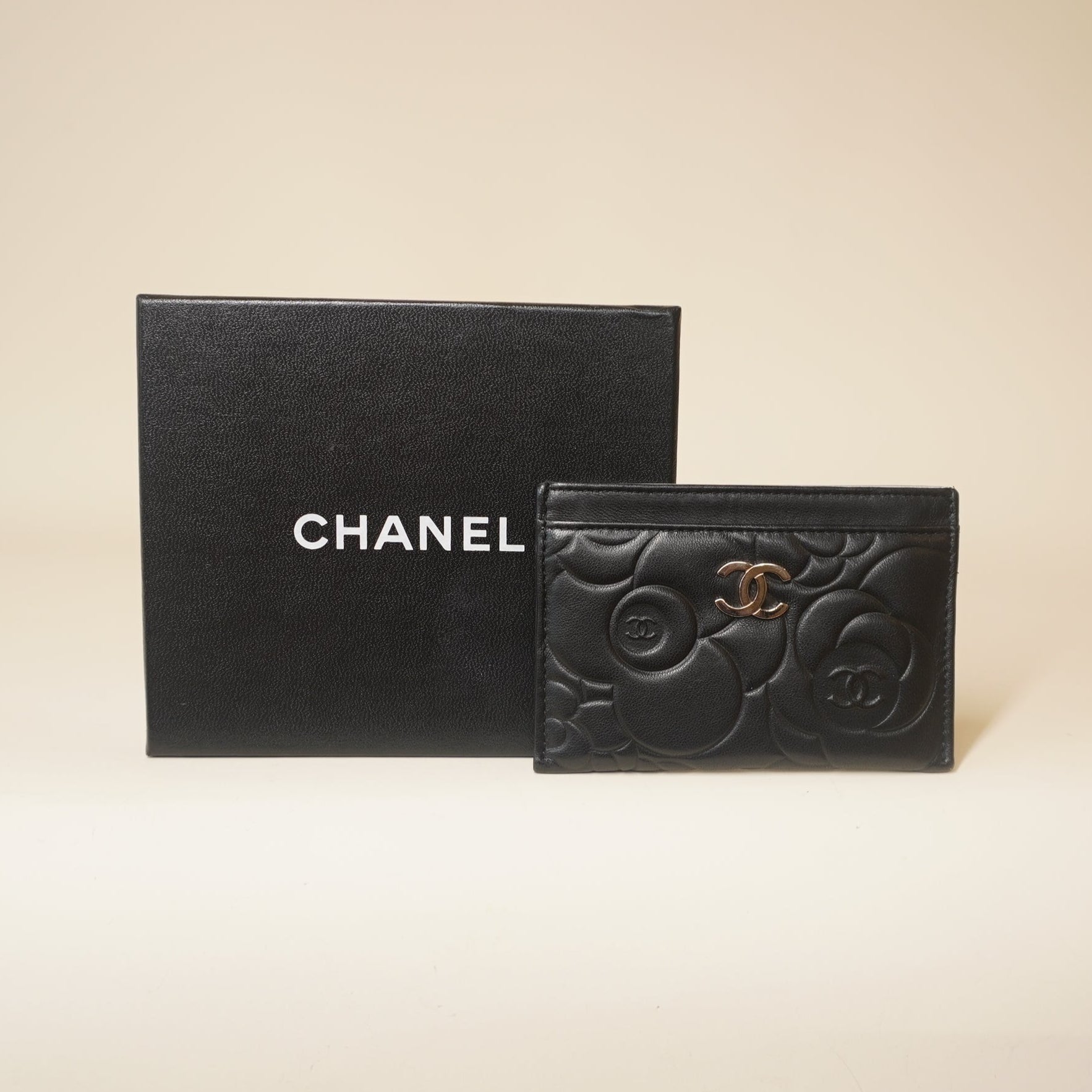 PRE-OWNED CC Black Lambskin Camellia Embossed Card Holder