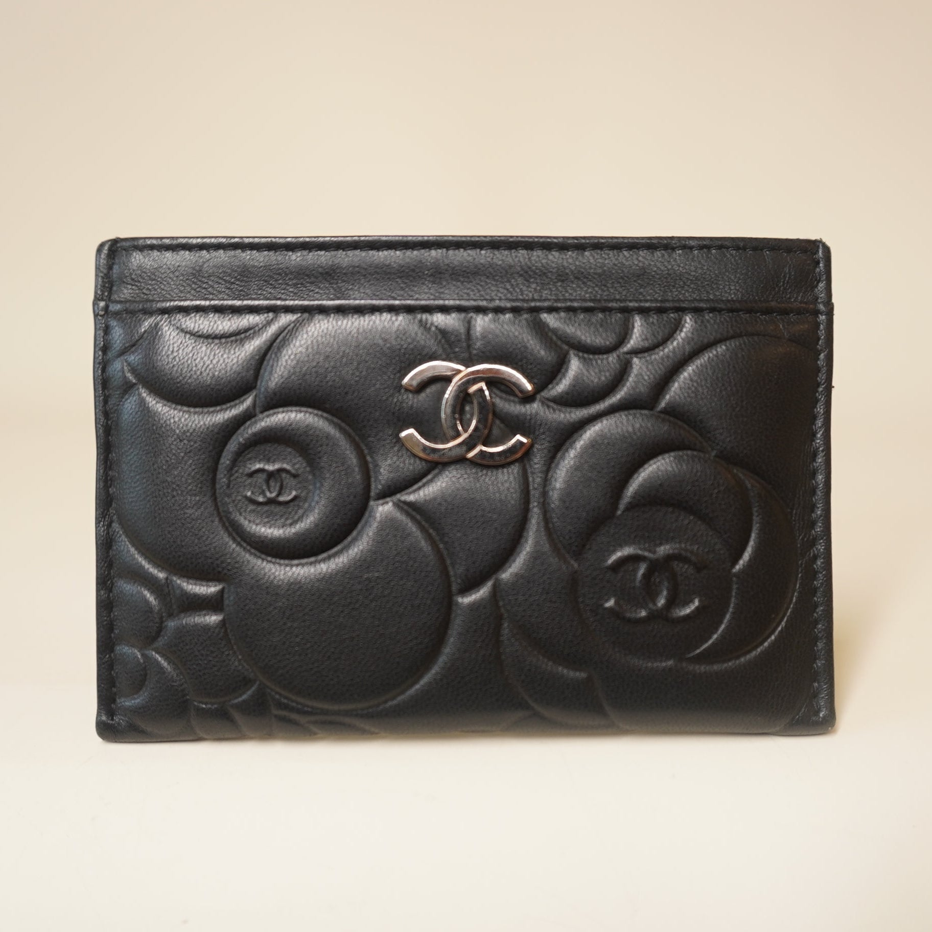 PRE-OWNED CC Black Lambskin Camellia Embossed Card Holder