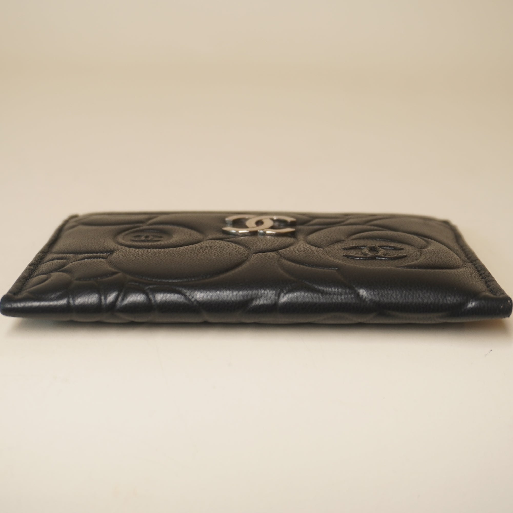 PRE-OWNED CC Black Lambskin Camellia Embossed Card Holder