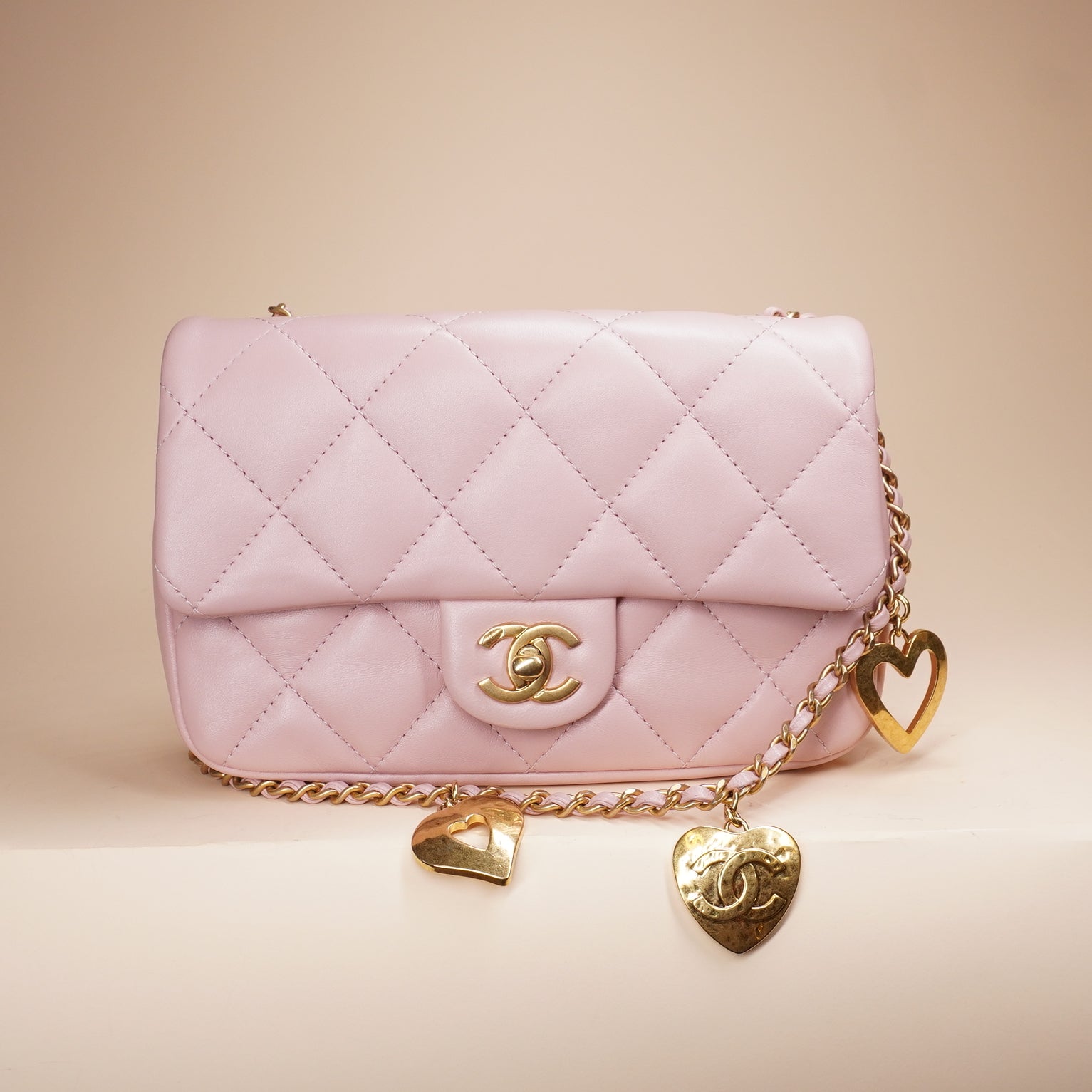 PRE-OWNED CC Pink Lambskin Quilted Mini Heart Charms Flap Crossbody Bag