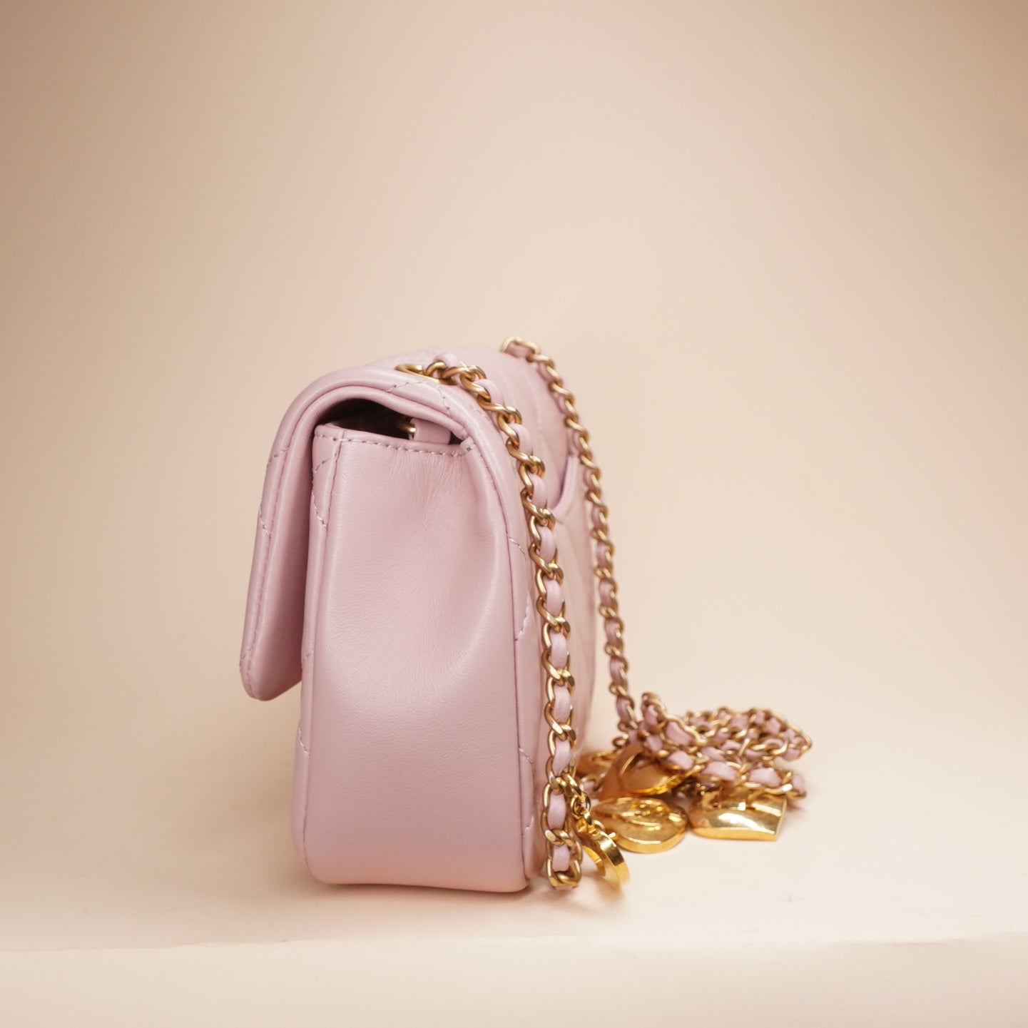 PRE-OWNED CC Pink Lambskin Quilted Mini Heart Charms Flap Crossbody Bag