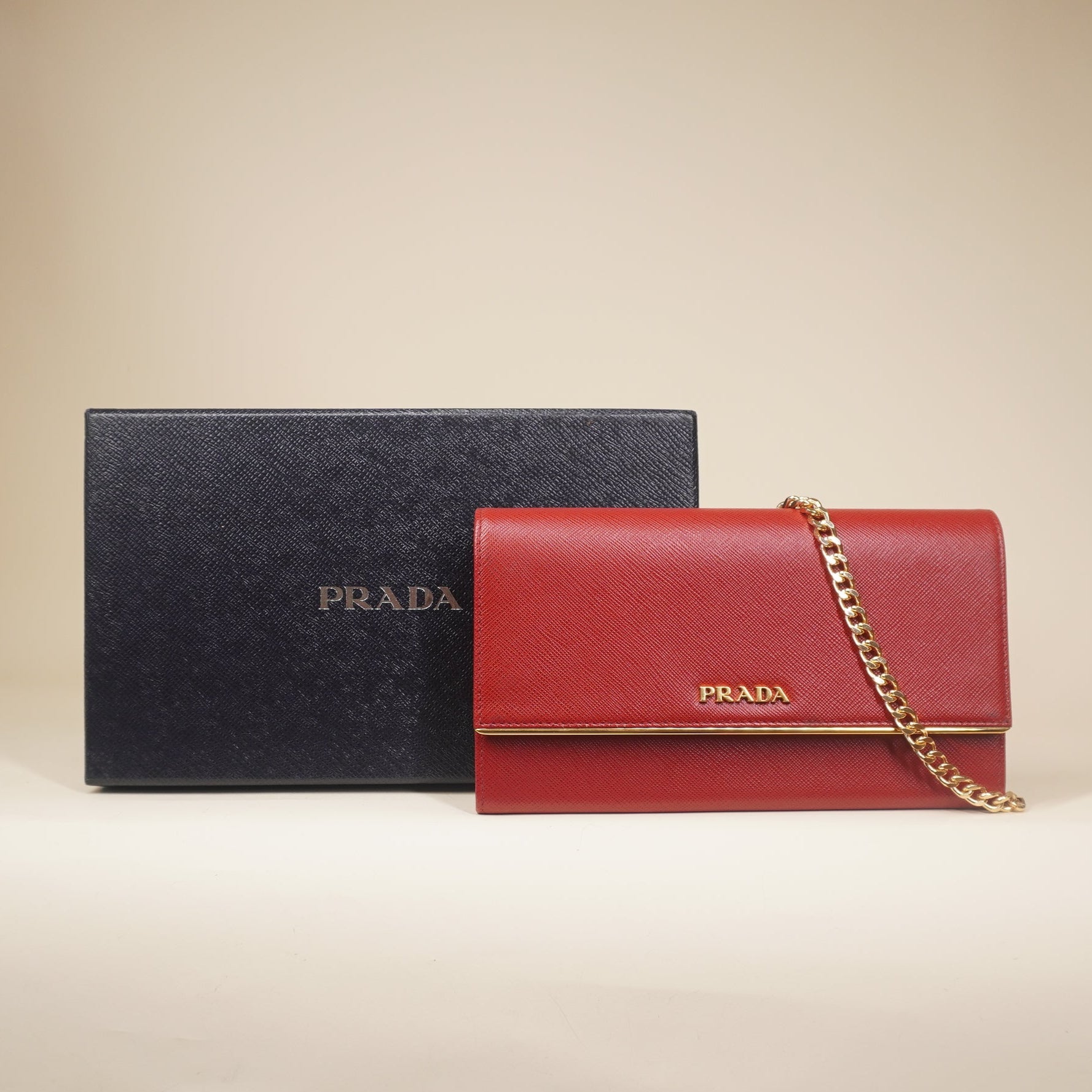 PRE-OWNED Red Saffiano Metal Bar Chain Wallet Fuoco
