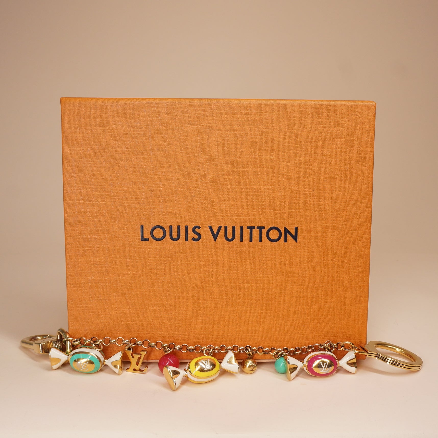 PRE-OWNED LV Gold Metal Candy Keyring Chain Bag Charm Golden
