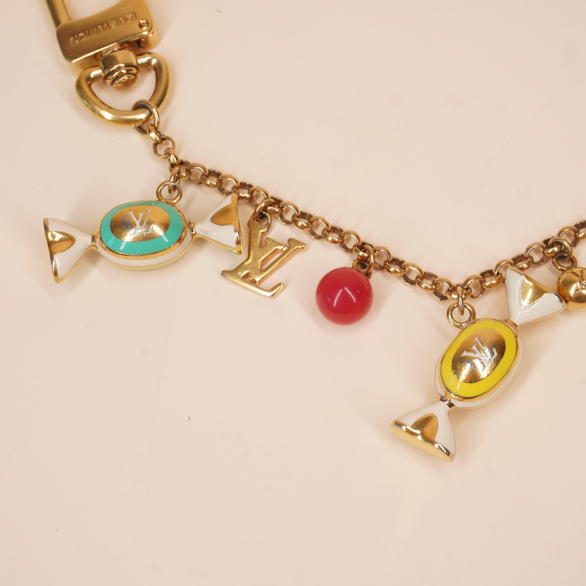 PRE-OWNED LV Gold Metal Candy Keyring Chain Bag Charm Golden