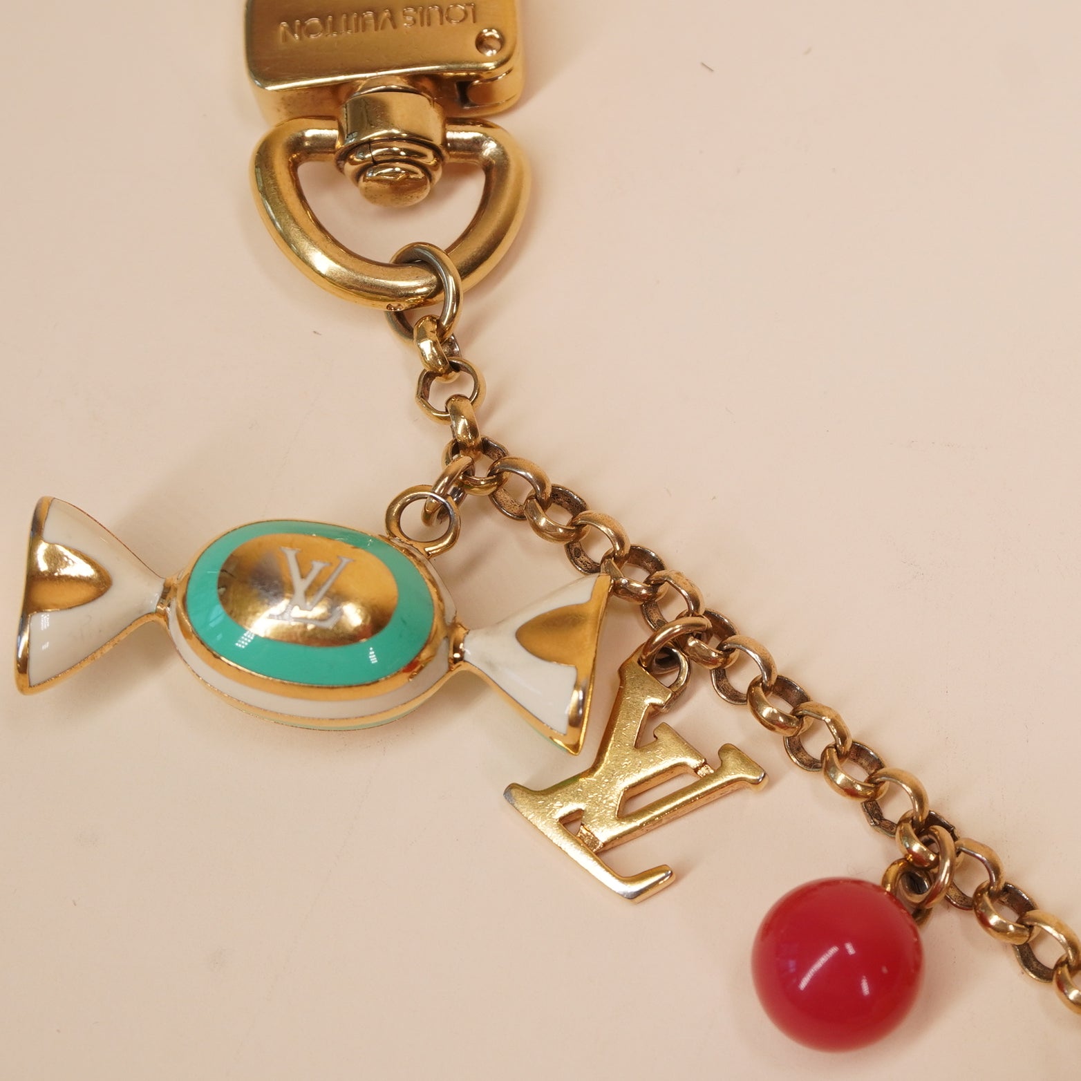 PRE-OWNED LV Gold Metal Candy Keyring Chain Bag Charm Golden