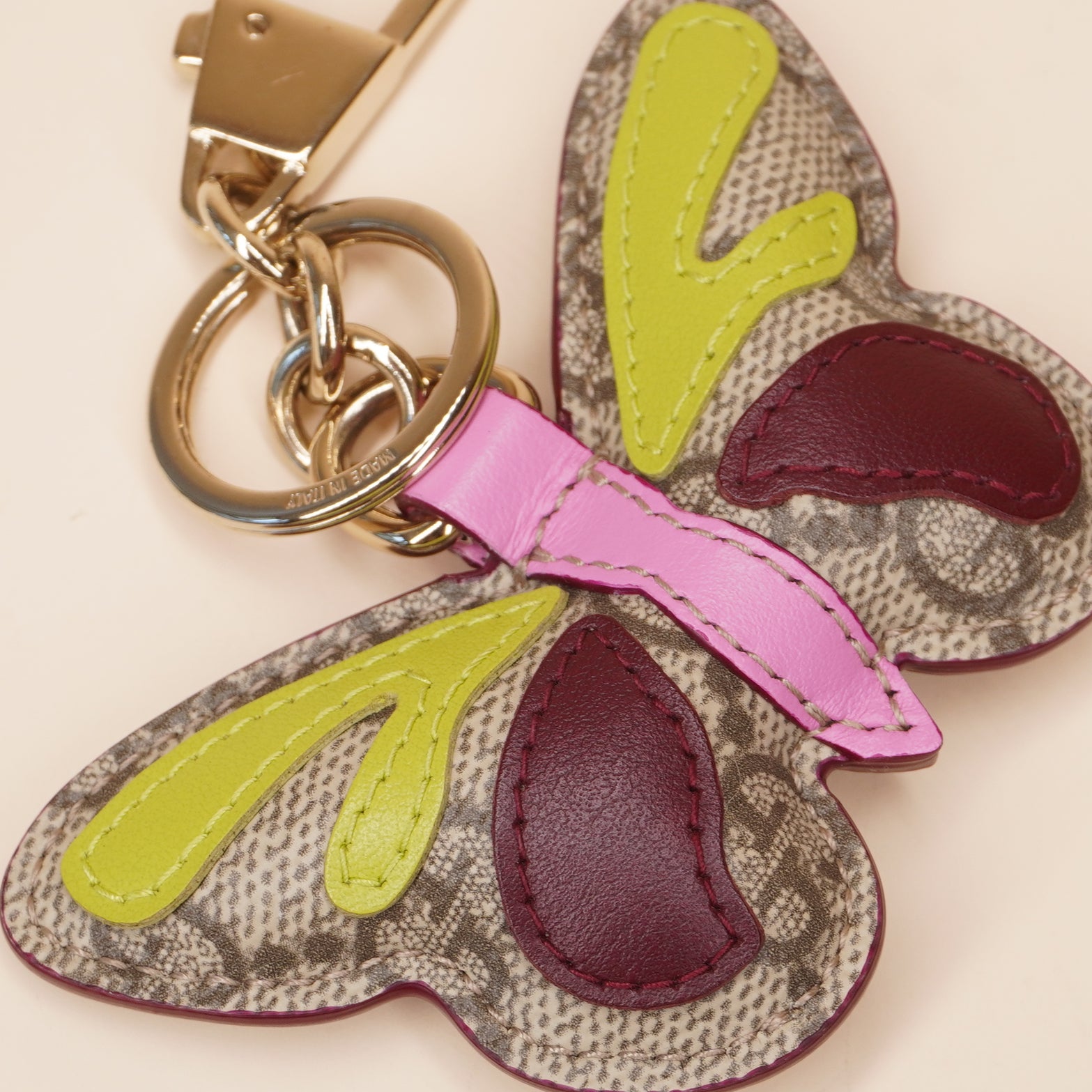 PRE-OWNED GG Butterfly Bag Charm in GG Canvas & Leather