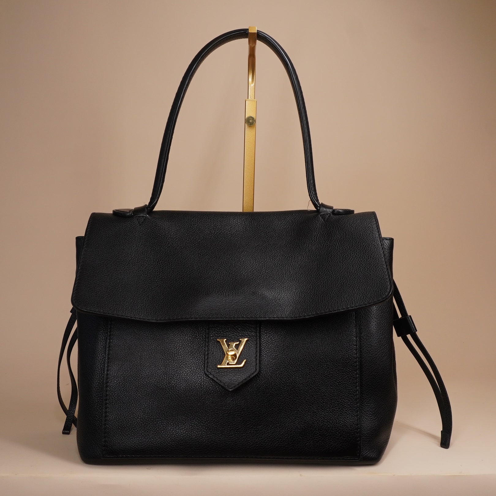 PRE-OWNED LV Black Calfskin Leather Lockme MM Bag
