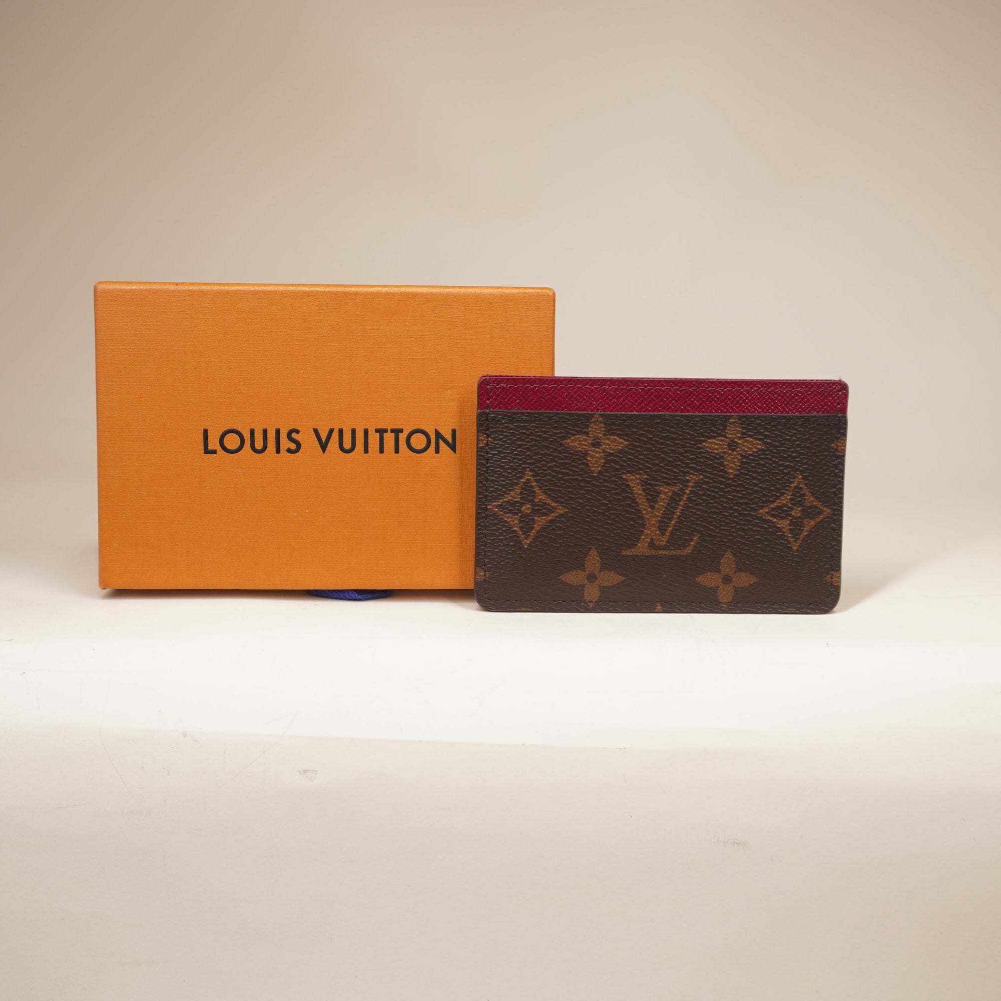 PRE-OWNED Porte Cult Sample Monogram Card Case Red Monogram Canvas