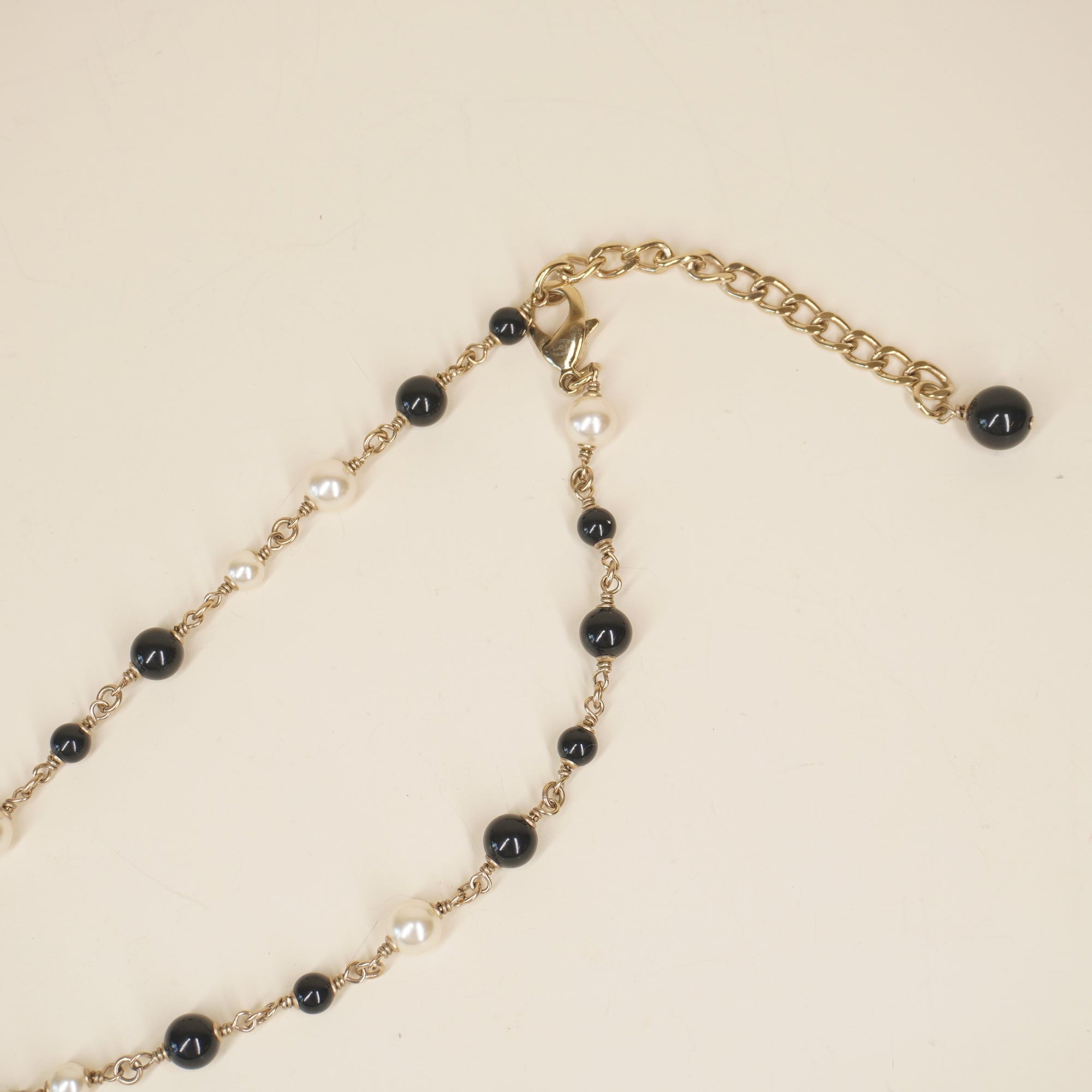 PRE-OWNED CC Enamel Crystal Pearl CC Lion Hardware Necklace