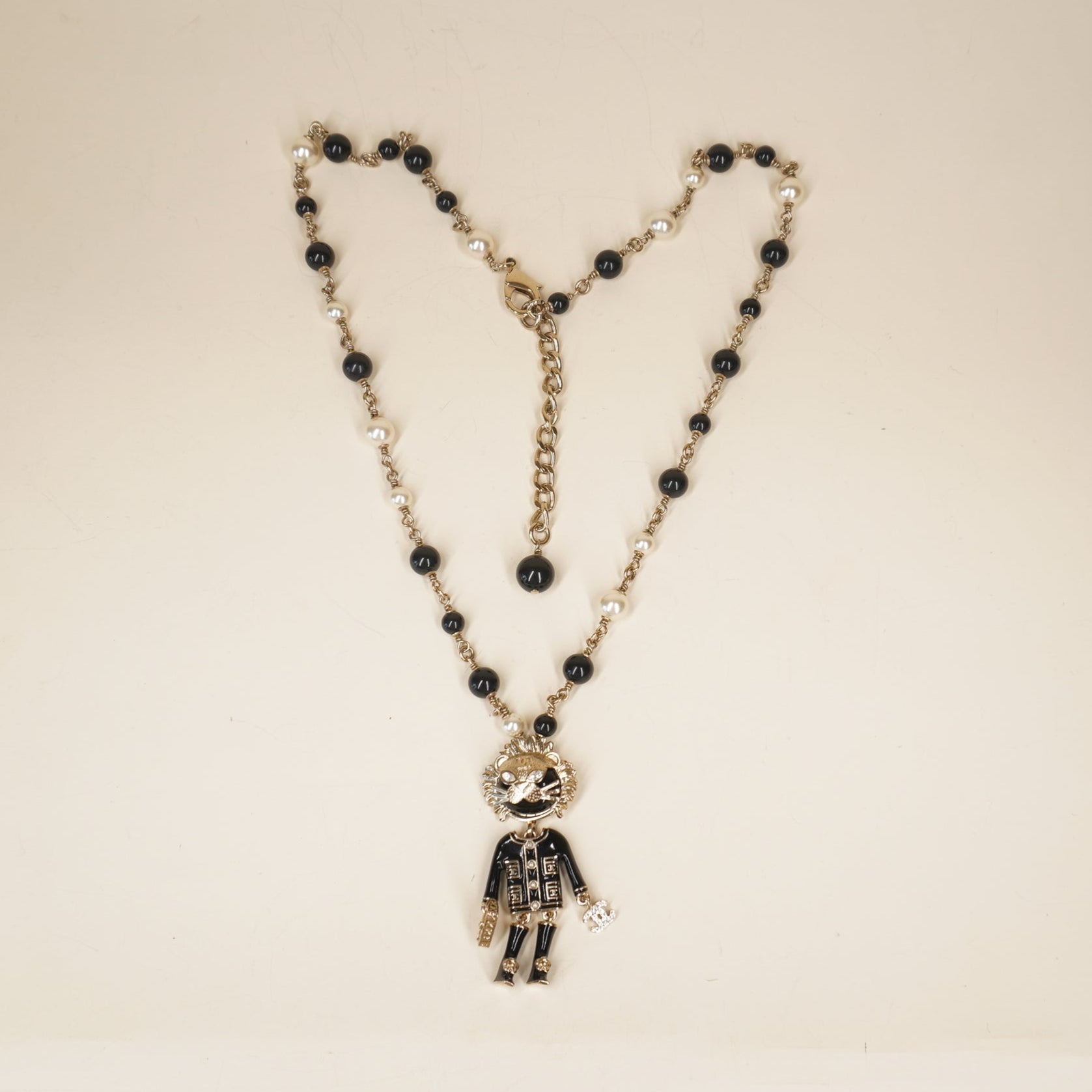 PRE-OWNED CC Enamel Crystal Pearl CC Lion Hardware Necklace