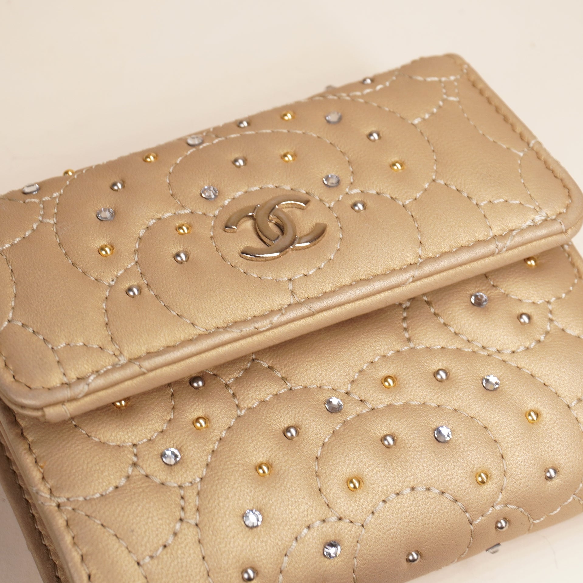 PRE-OWNED CC Metallic Gold Camellia Studded Small Flap Wallet