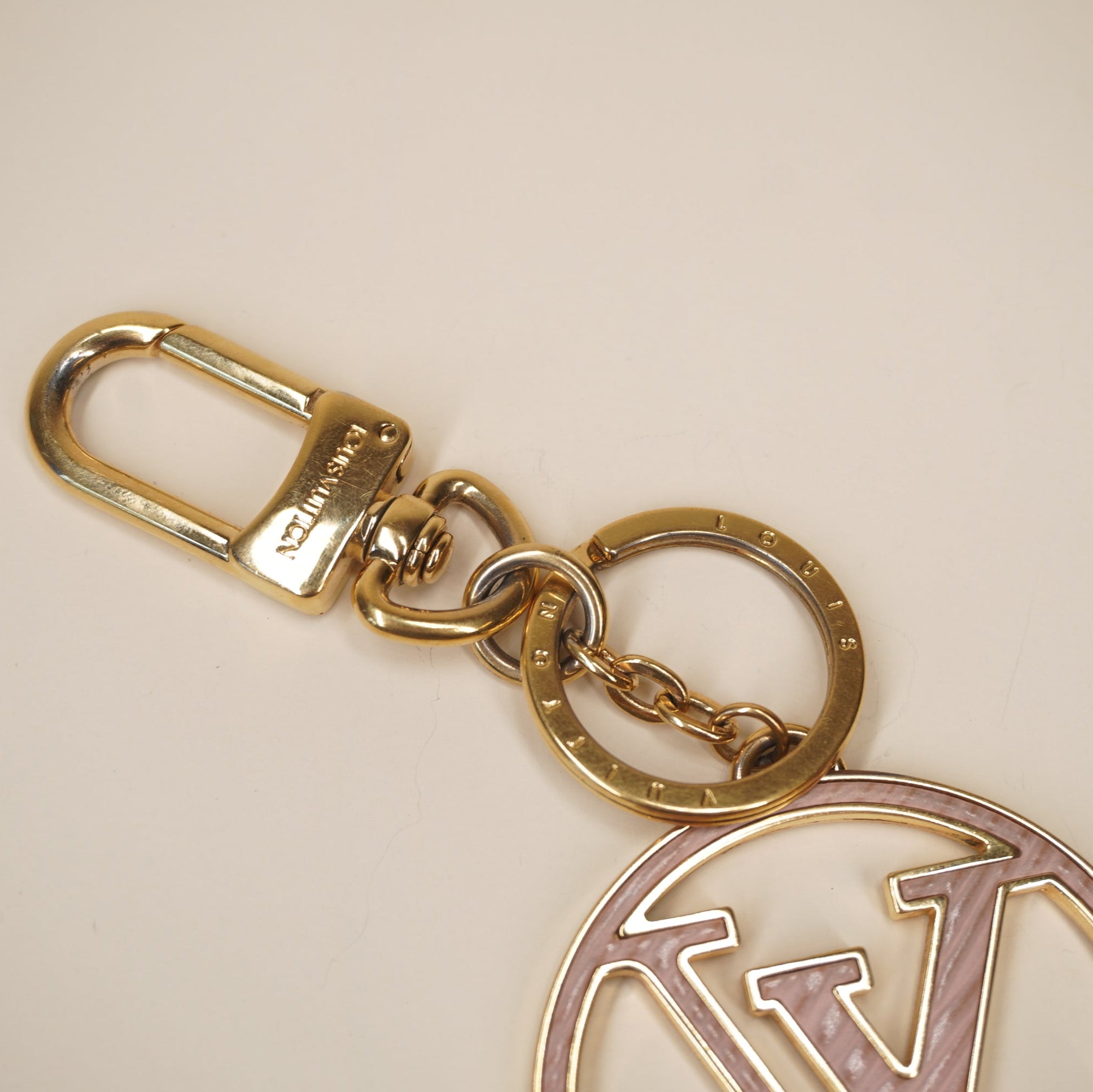 PRE-OWNED Epi LV Circle Bag Charm Key Holder Red Pink