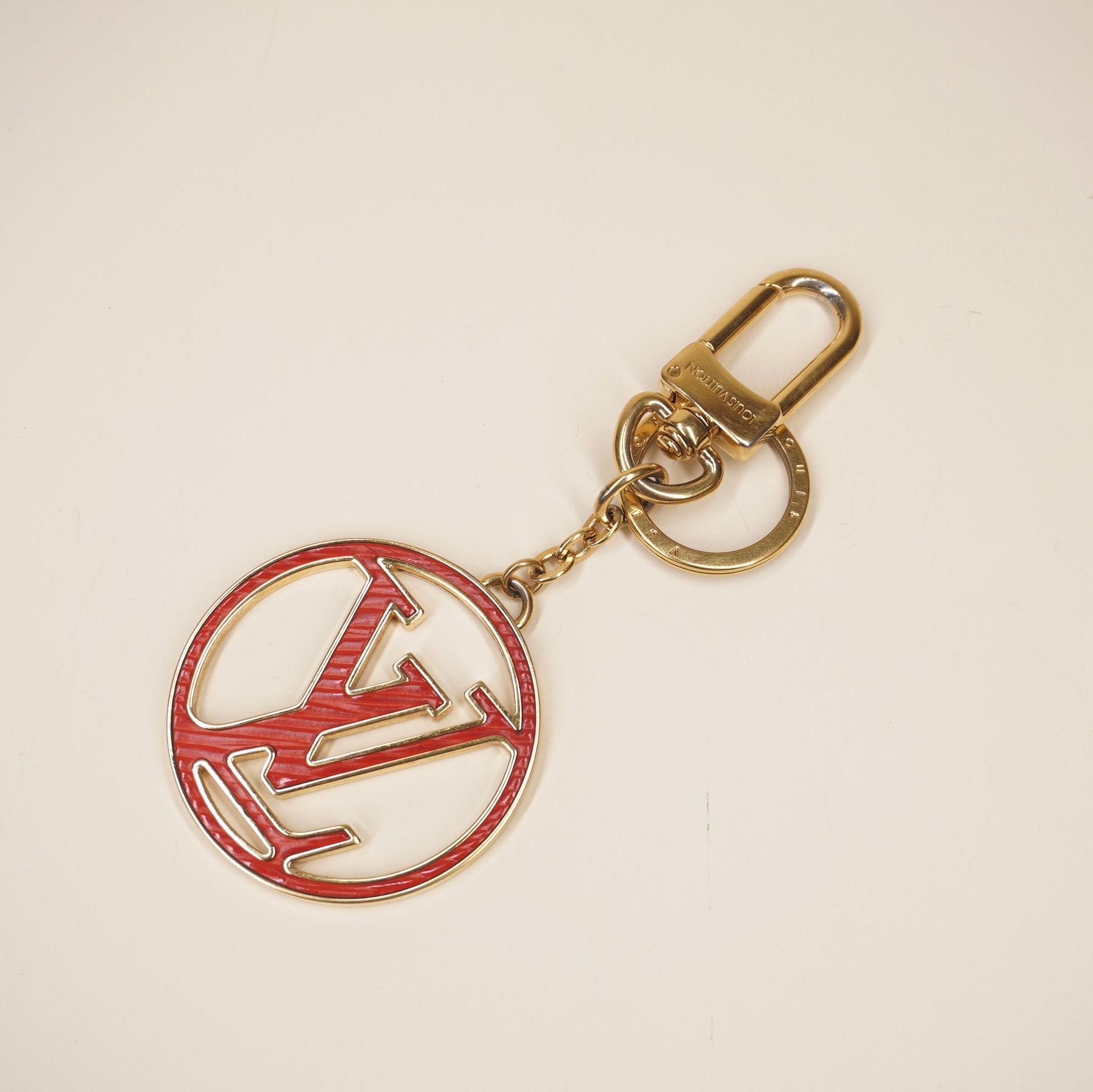 PRE-OWNED Epi LV Circle Bag Charm Key Holder Red Pink