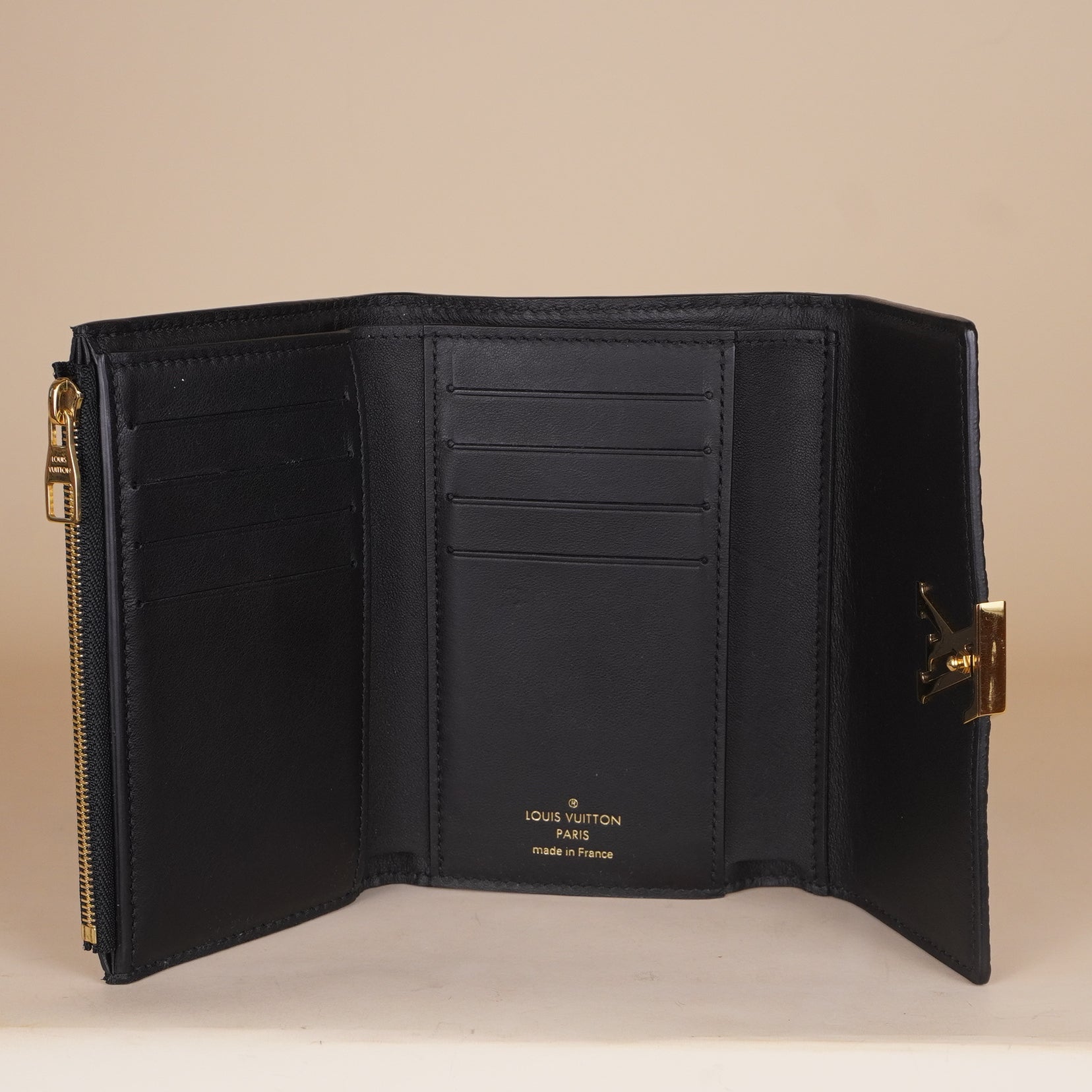 PRE-OWNED LV Capucine Compact Tri-Fold Wallet Black Leather