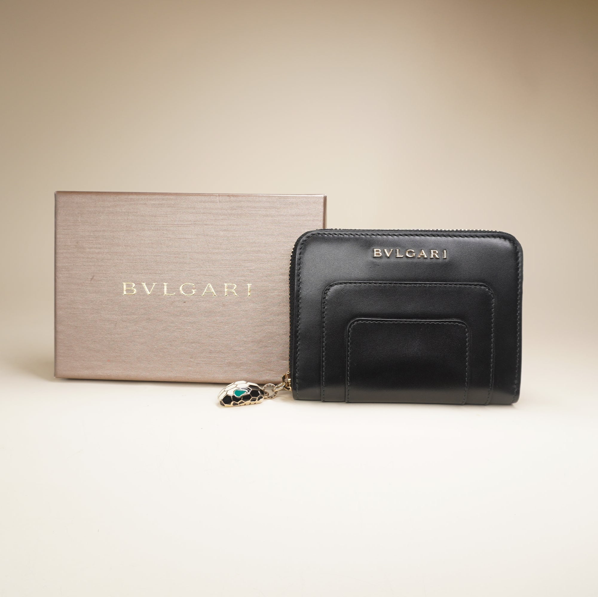 PRE-OWNED Black Calfskin Serpenti Zip Around Wallet