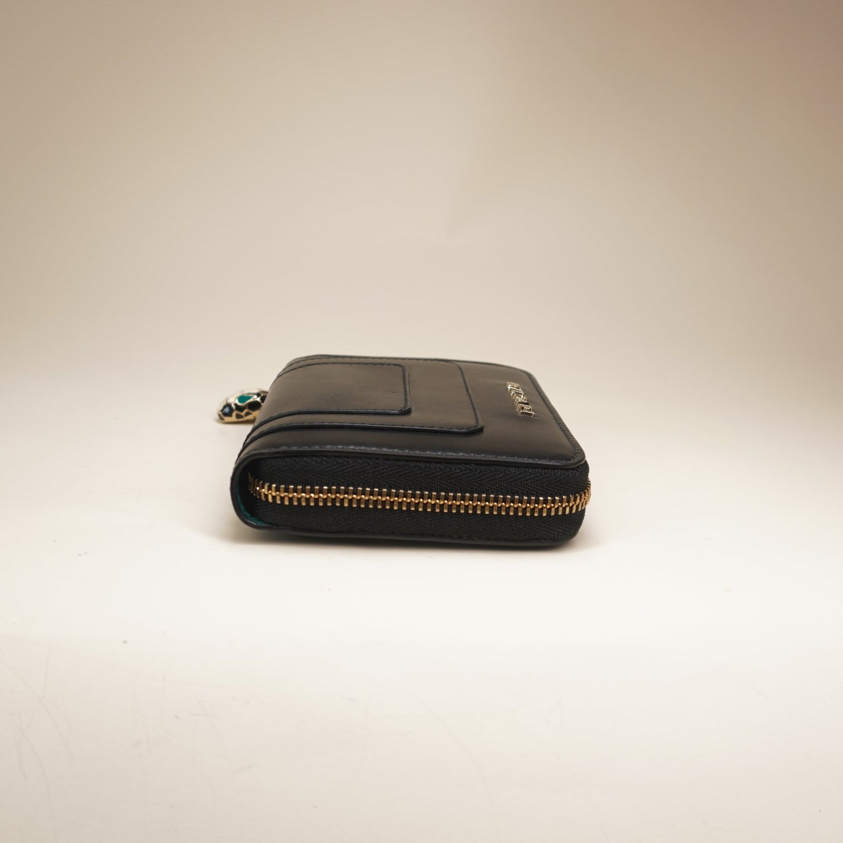PRE-OWNED Black Calfskin Serpenti Zip Around Wallet