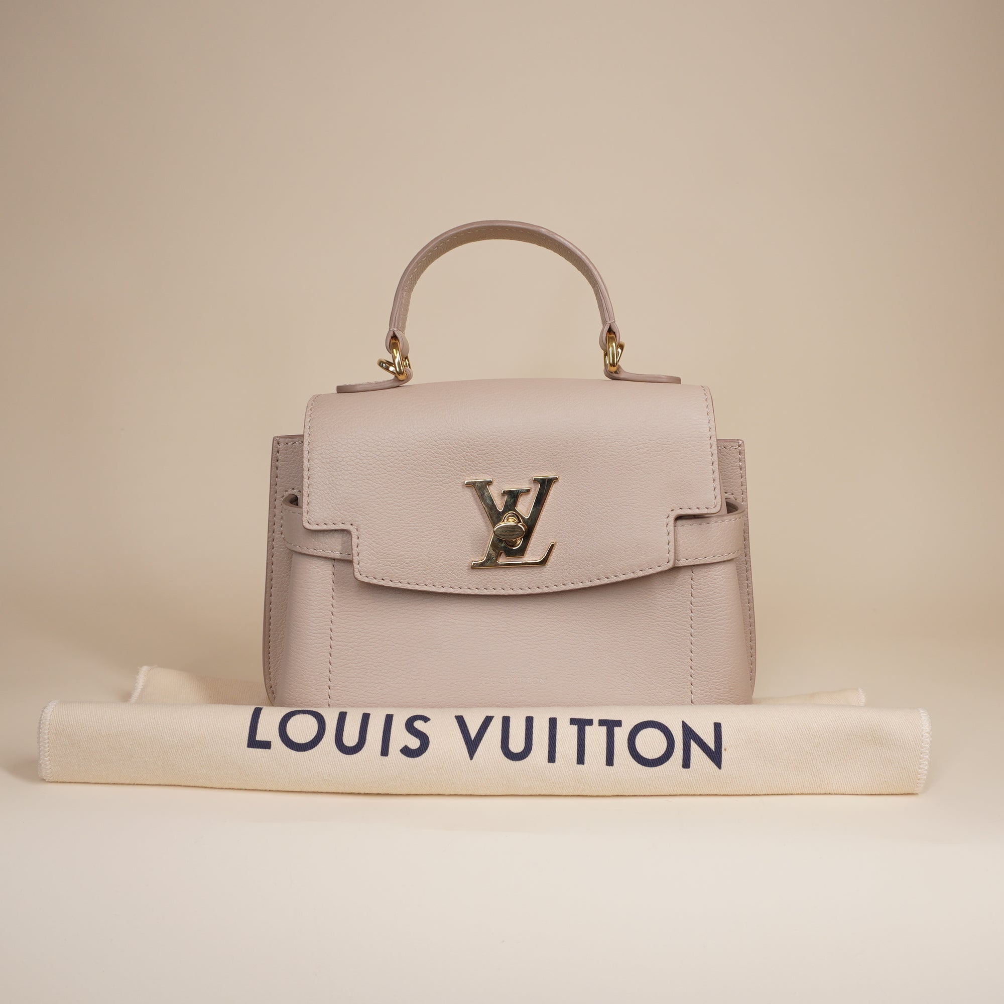 PRE-OWNED LV LockMe Ever Mini Shoulder Bag