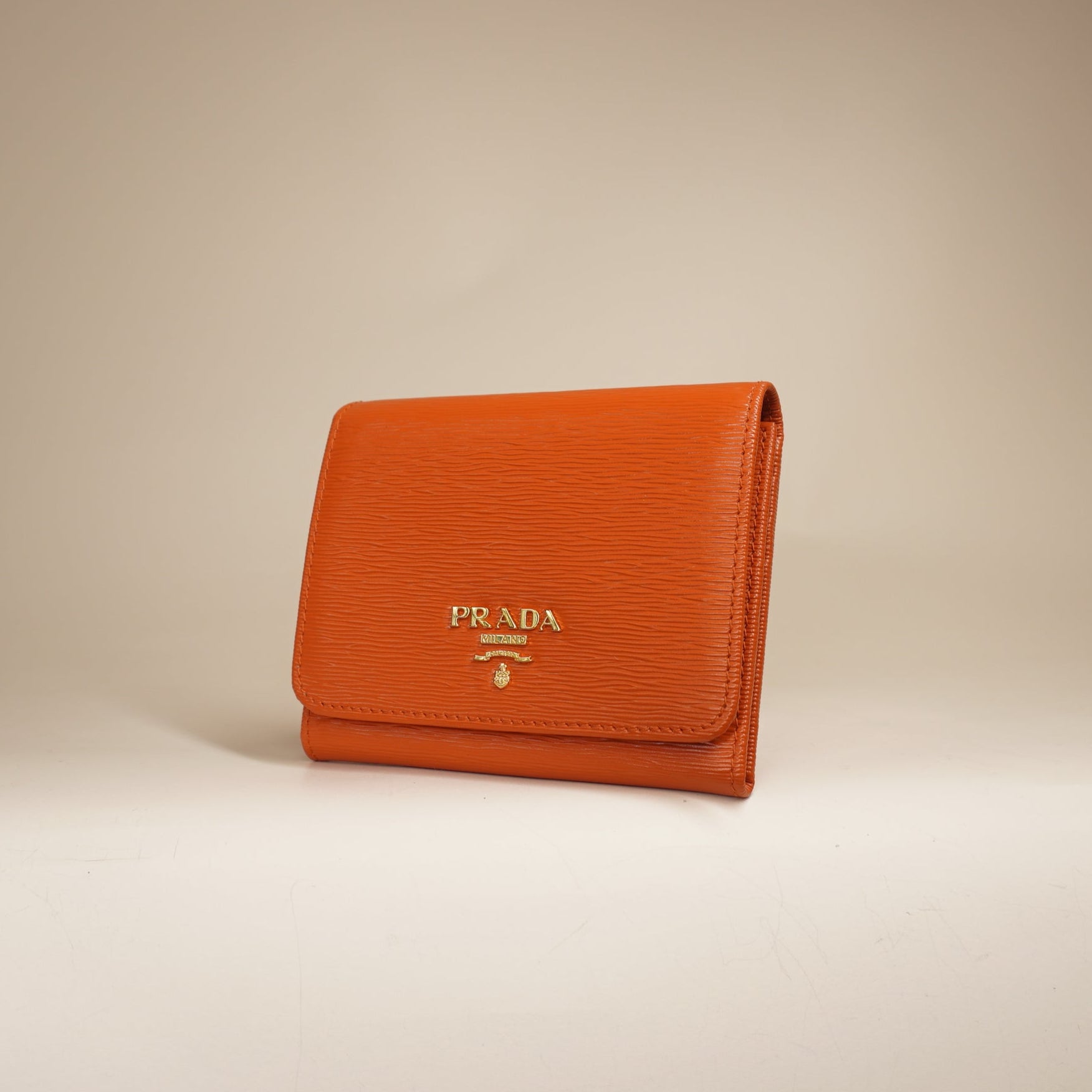PRE-OWNED  Vitello Move Bifold Wallet Papaya