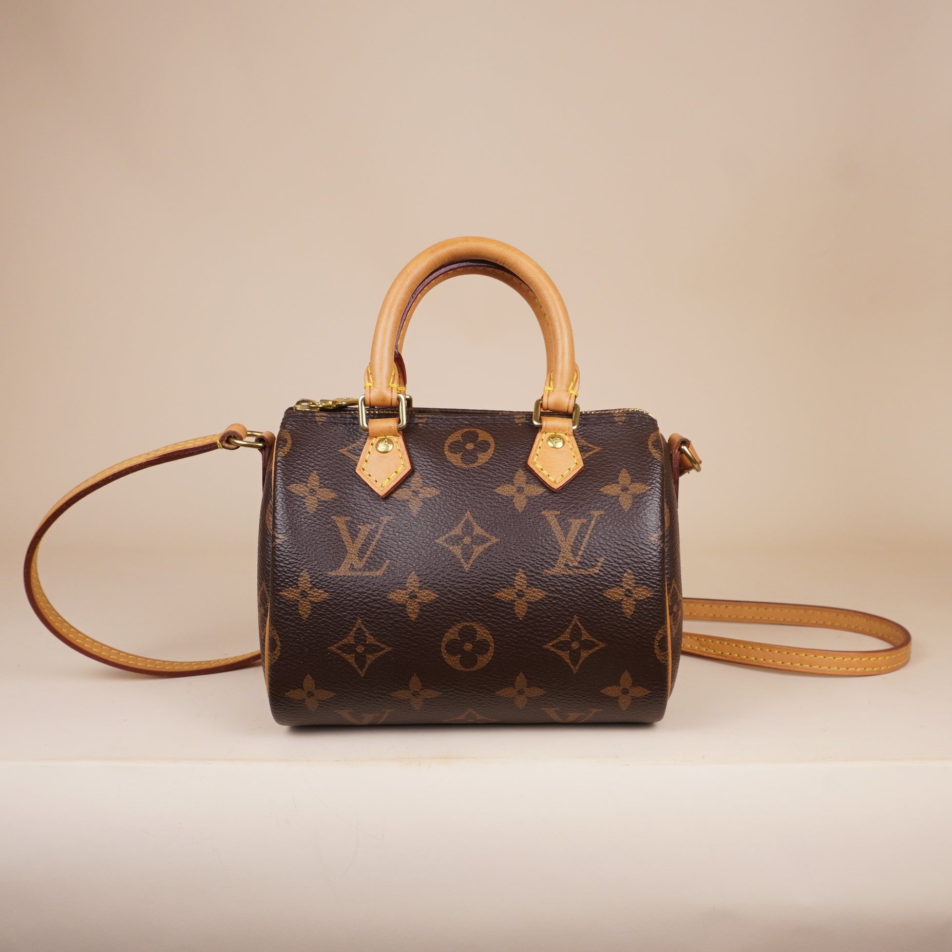 PRE-OWNED LV Monogram Nano Speedy Coated Canvas