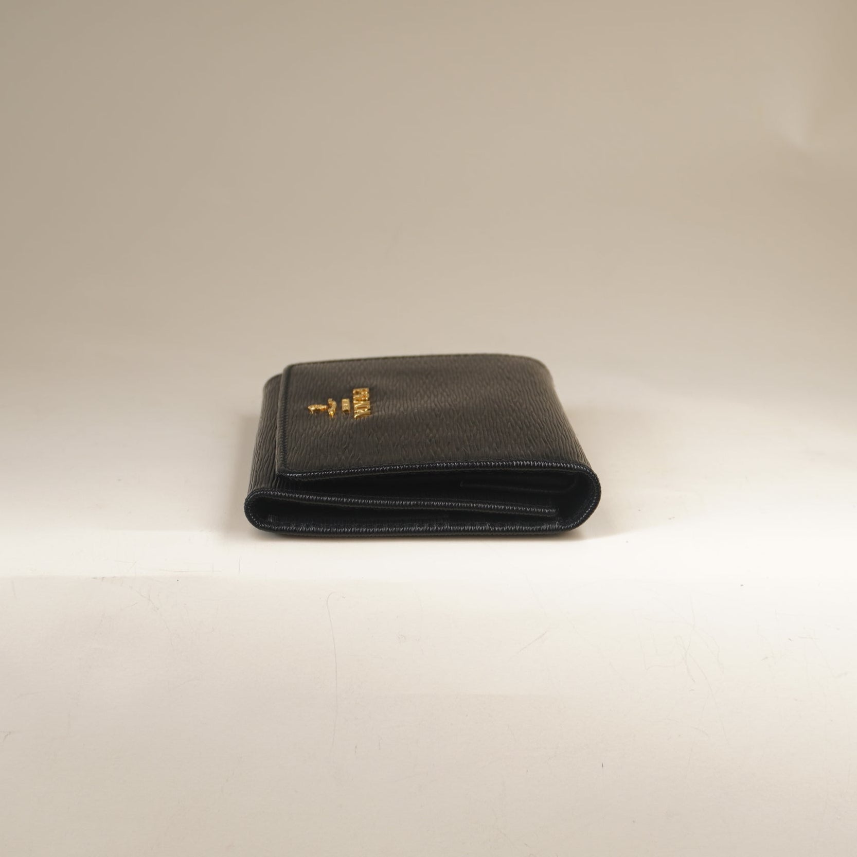 PRE-OWNED Vitello Move Bi-Fold Wallet Black