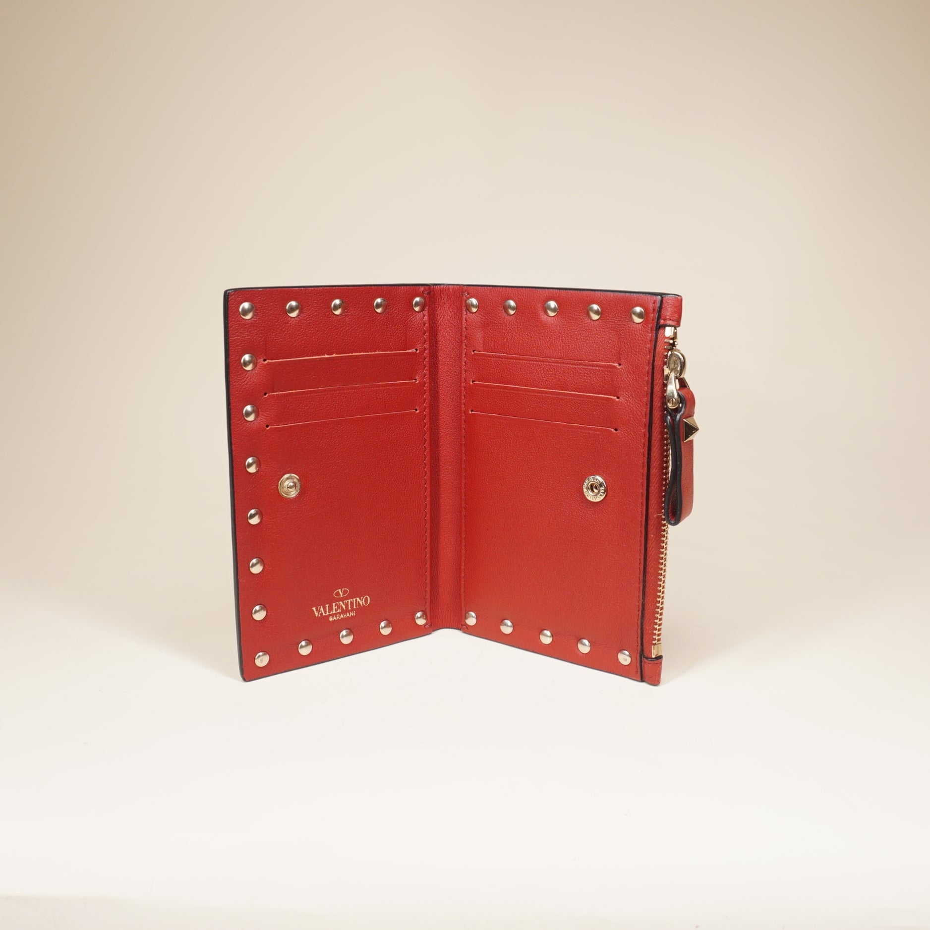 PRE-OWNED Rockstud Grained Calfskin Red Short Wallet