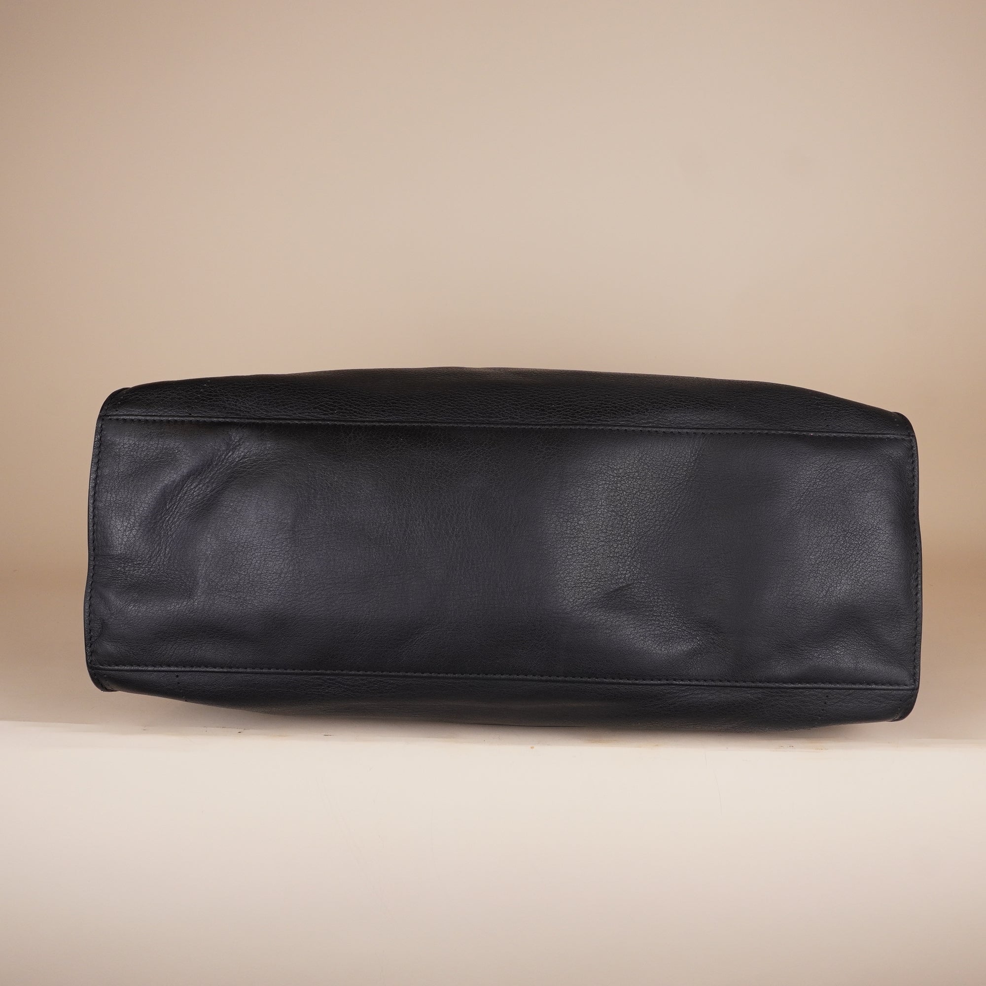 PRE-OWNED Black City Veau Soyeux Perforated Blackout Hardware Shoulder Bag