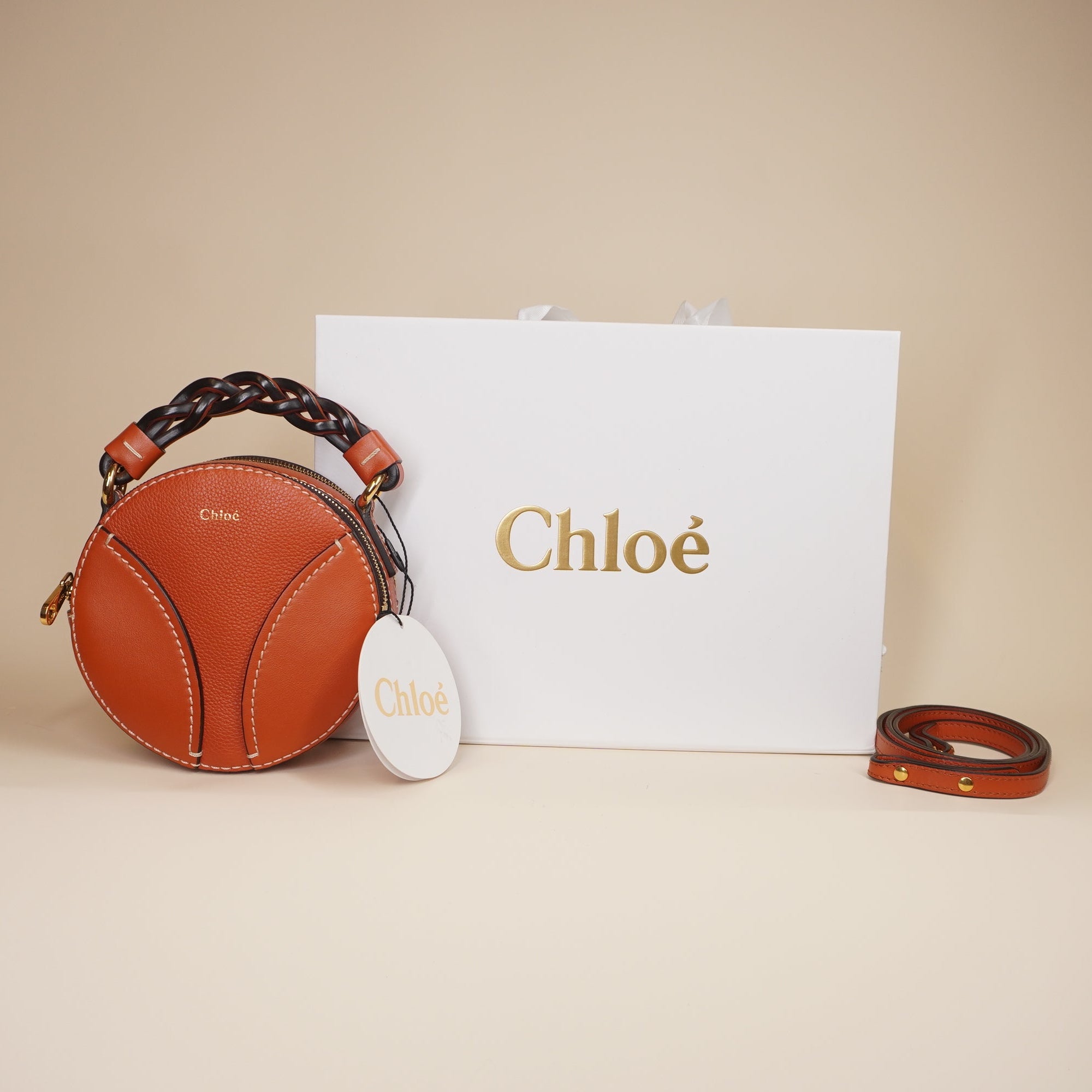 PRE-OWNED Daria Mini Round Leather Crossbody Bag Orange