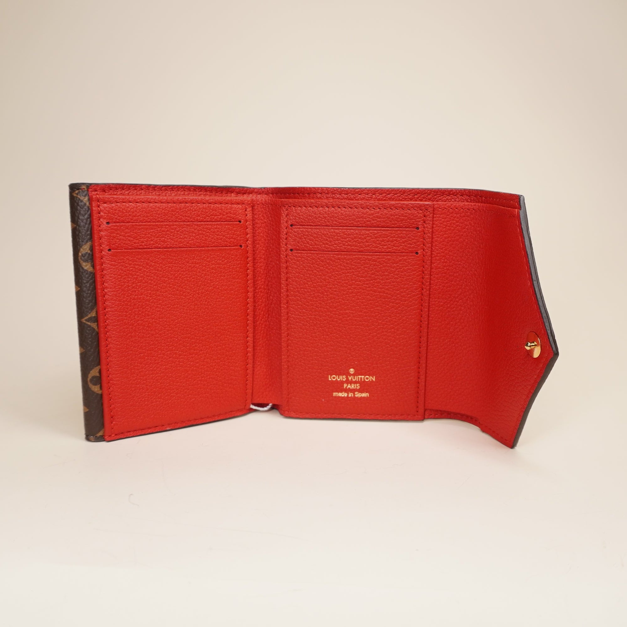 PRE-OWNED LV Red Canvas Double V Short Wallet