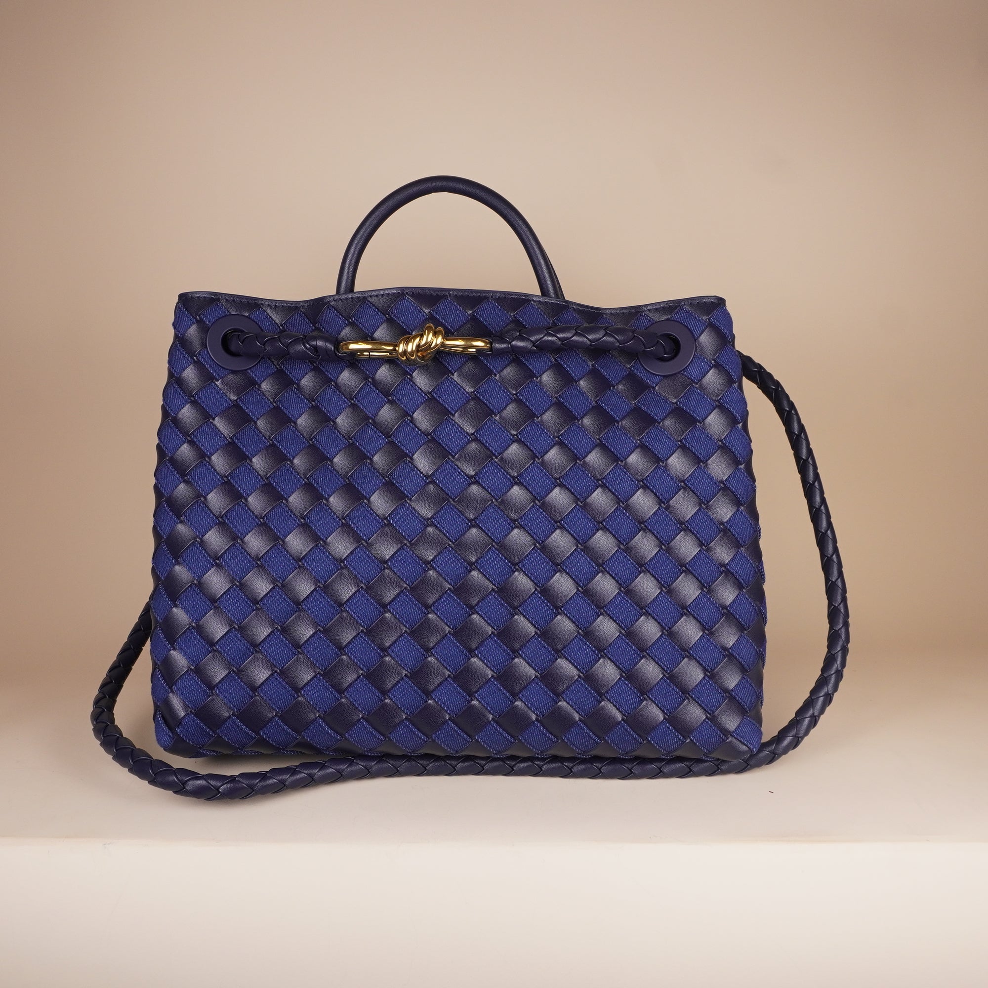 PRE-OWNED Abyss Indigo Nappa Intrecciato Denim Medium Andiamo Shoulder Bag