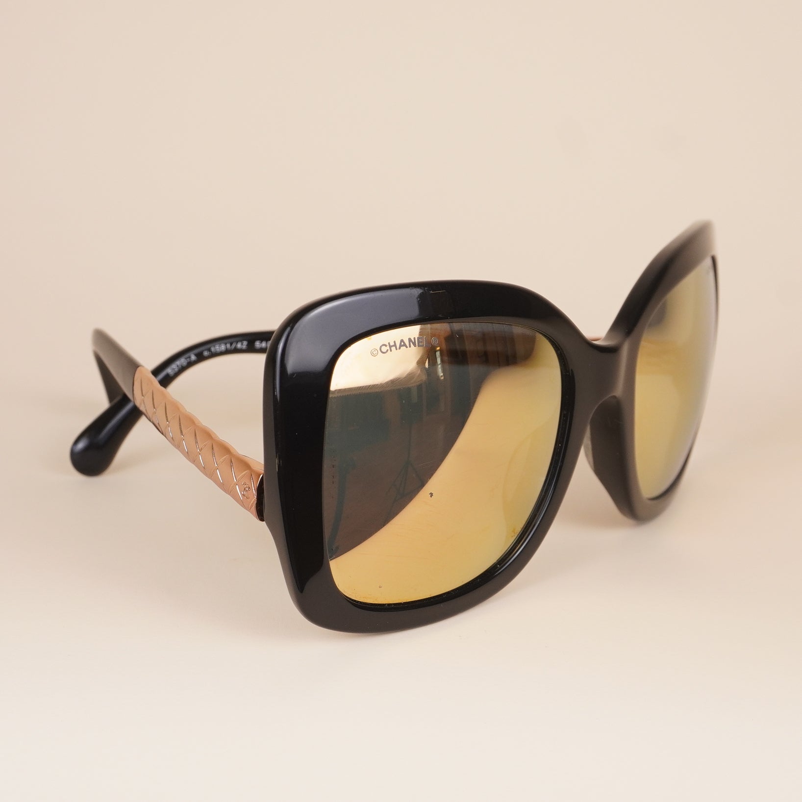 PRE-OWNED CC Black Acrylic Gold Toned Metal Quilted Side Sunglasses