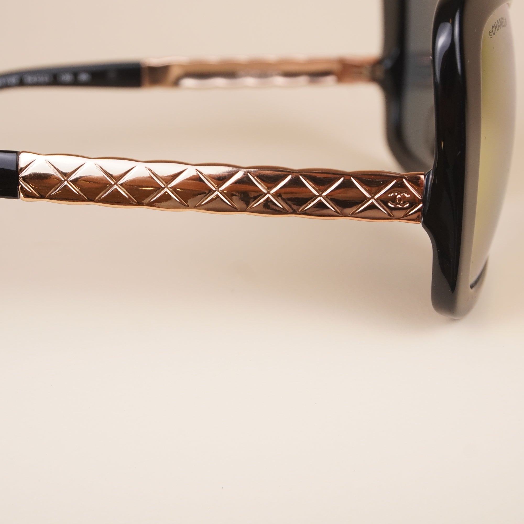 PRE-OWNED CC Black Acrylic Gold Toned Metal Quilted Side Sunglasses