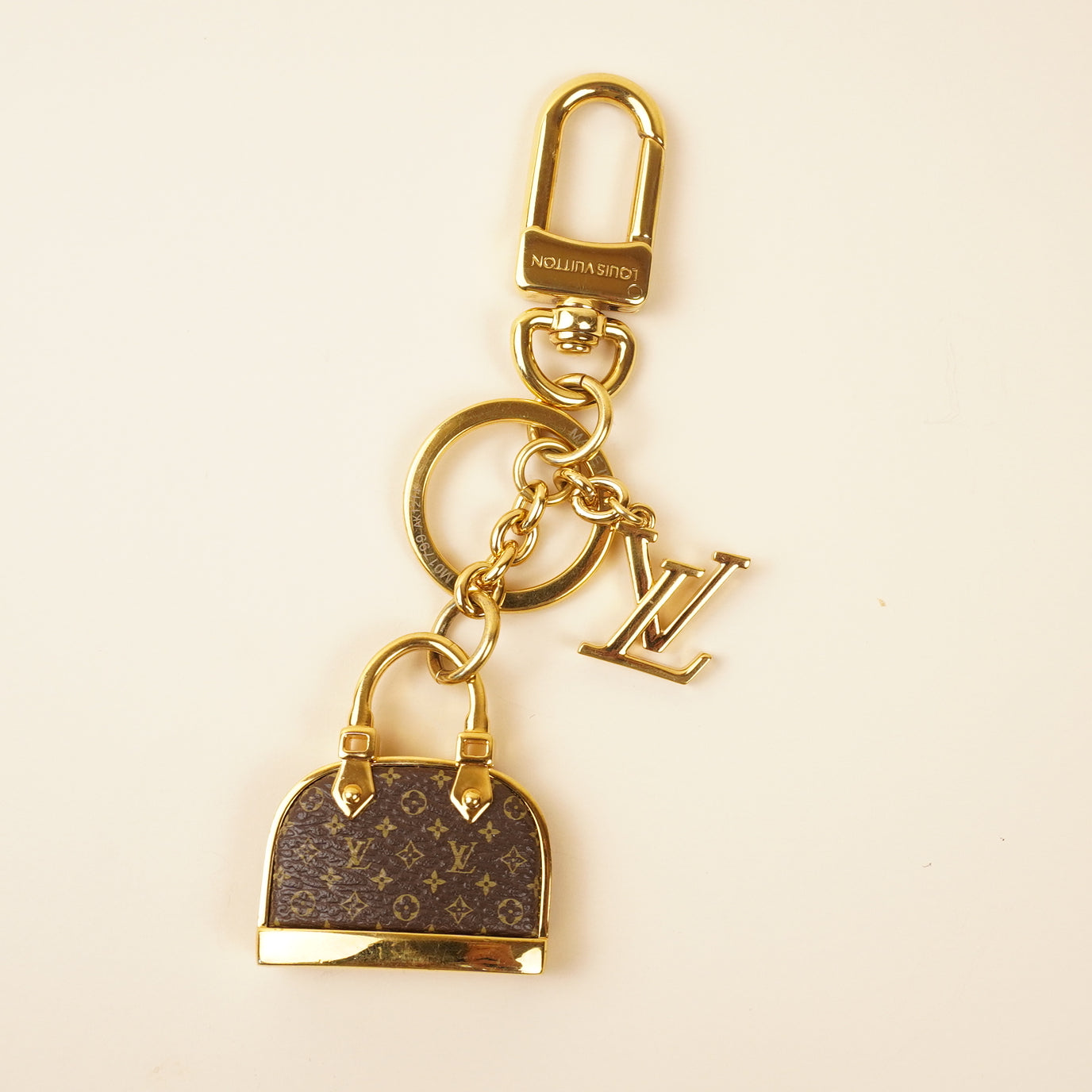 PRE-OWNED LV Monogram Iconic Alma Bag Charm