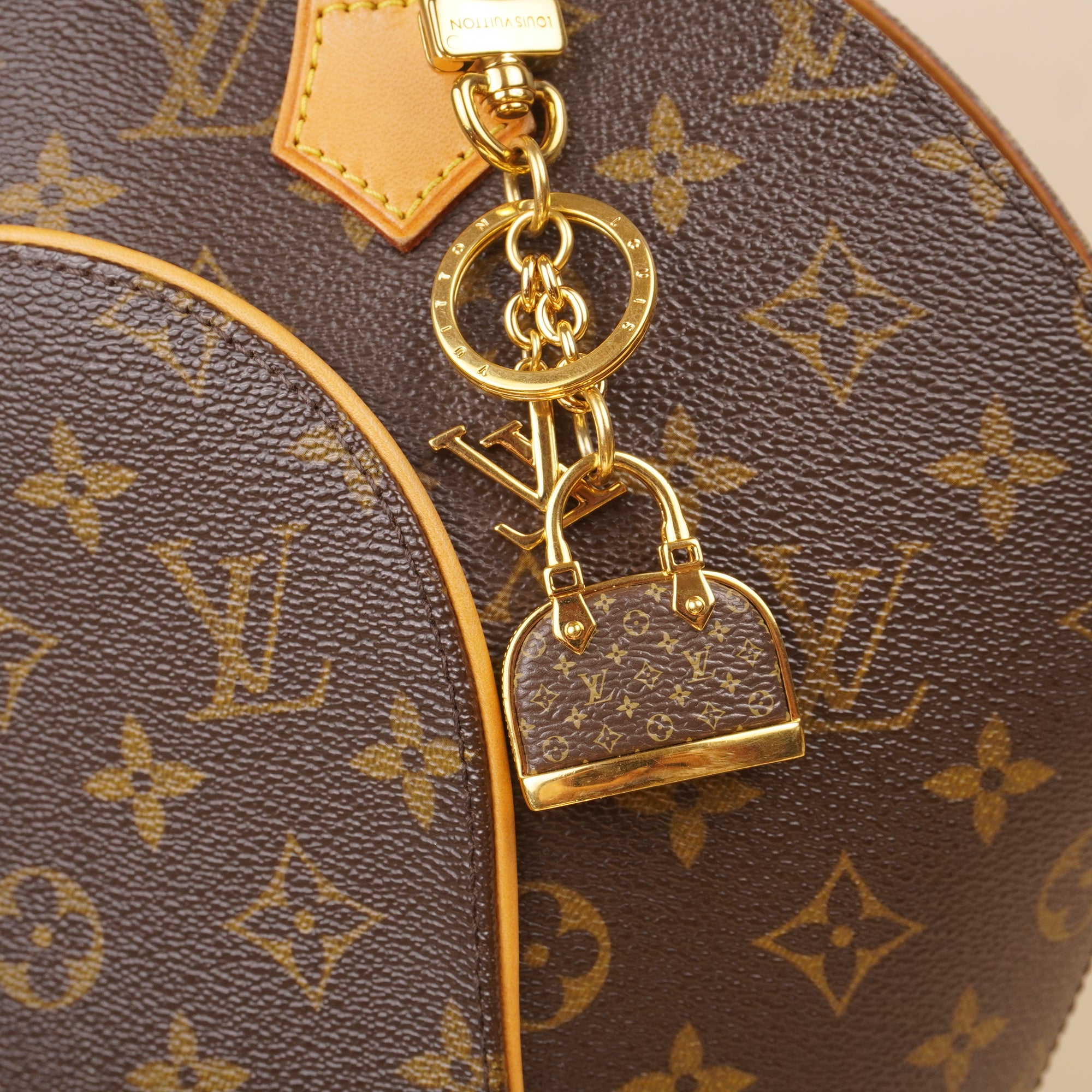 PRE-OWNED LV Monogram Iconic Alma Bag Charm