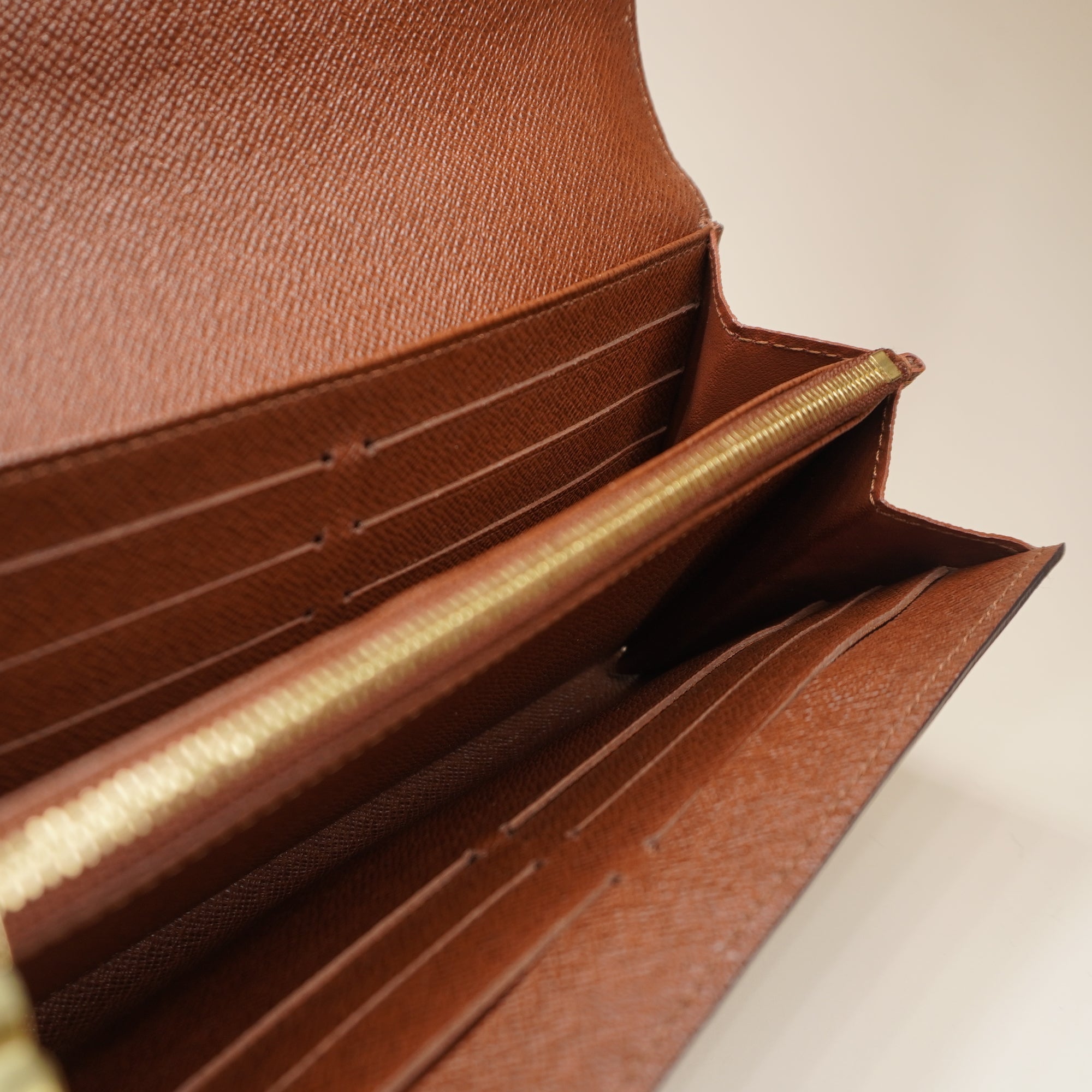 PRE-OWNED LV Monogram Canvas Sarah Wallet