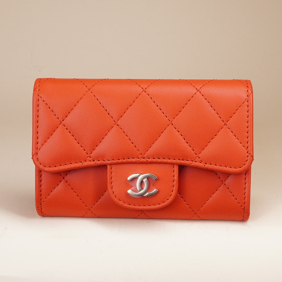PRE-OWNED CC Caviar Quilted Classic 4 Key Holder Wallet Orange Red