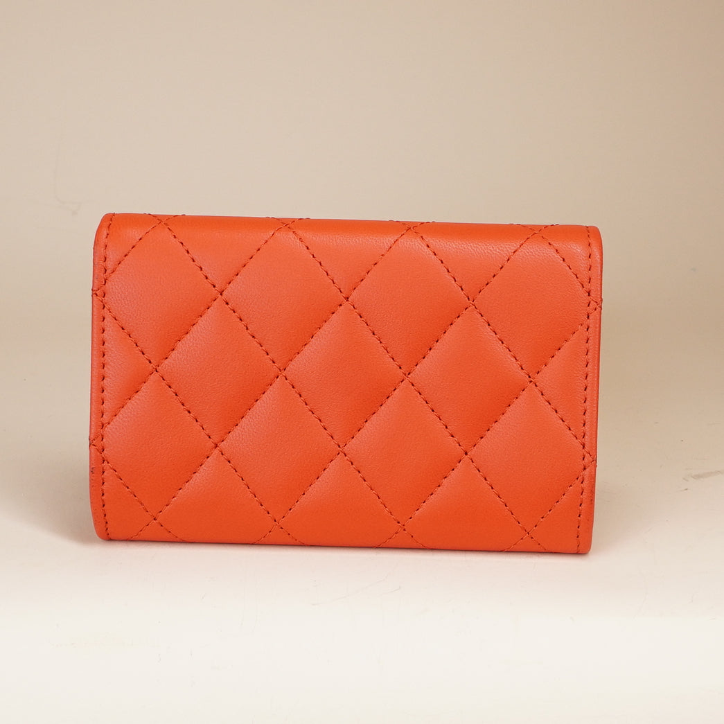 PRE-OWNED CC Caviar Quilted Classic 4 Key Holder Wallet Orange Red