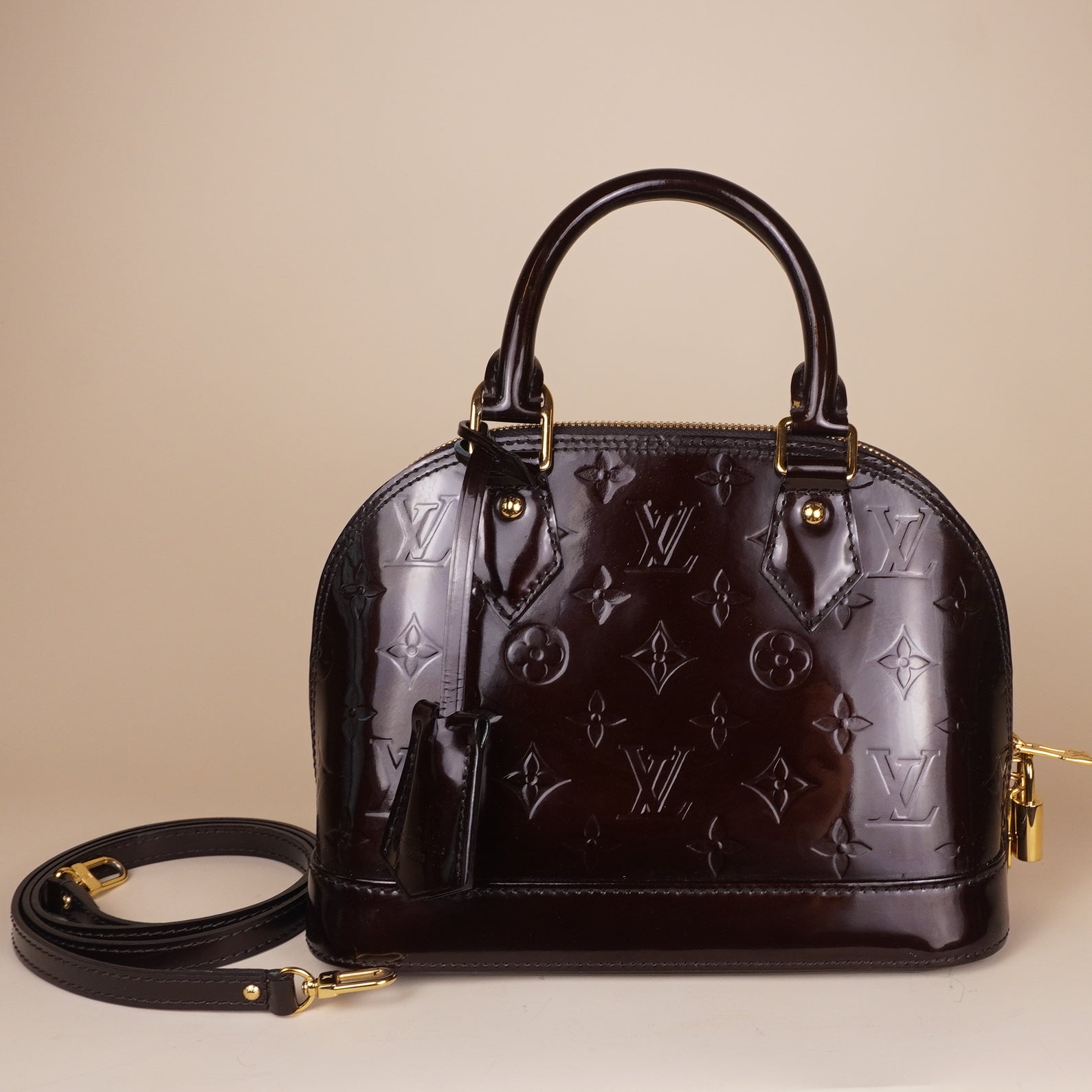 PRE-OWNED LV Vernis Alma PM Amarante